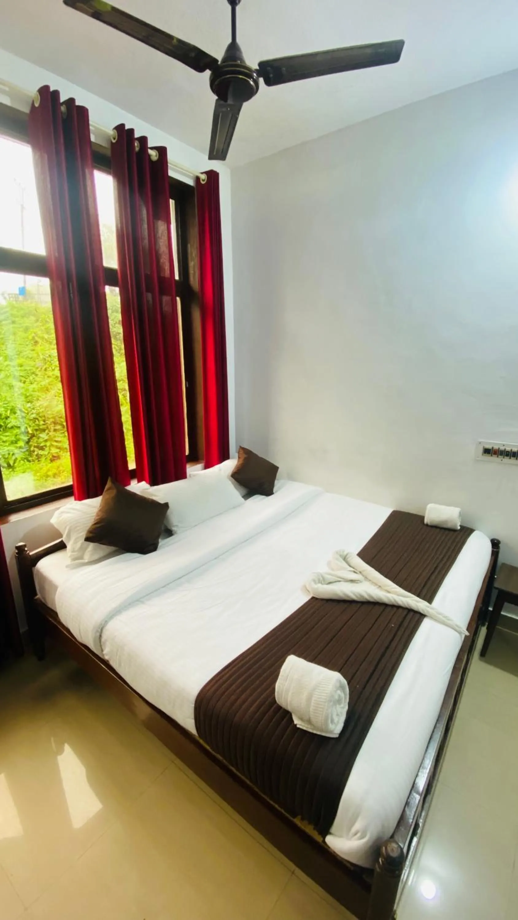 Bed in Hotel Caveri Inn