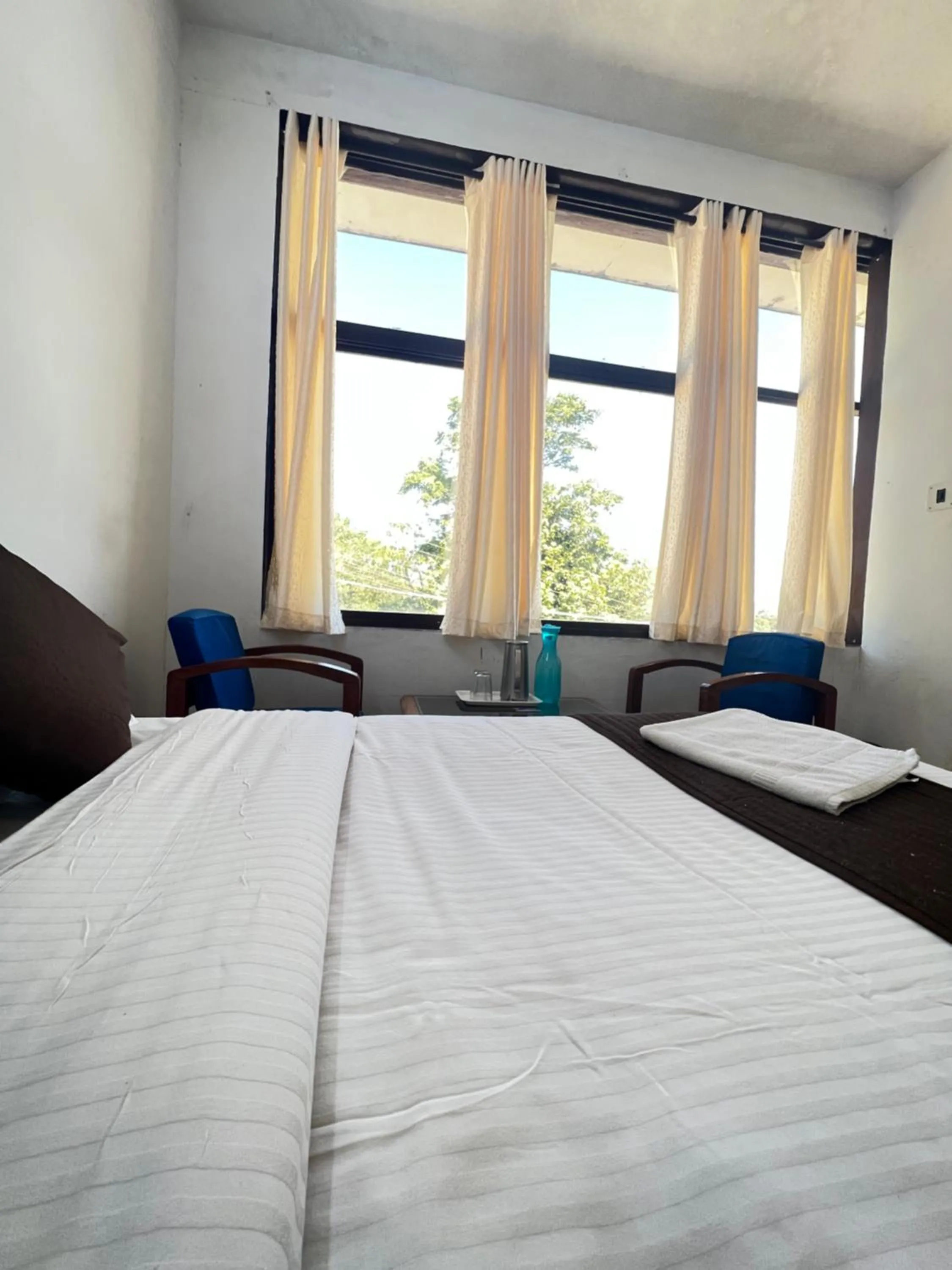 Bed in Hotel Caveri Inn