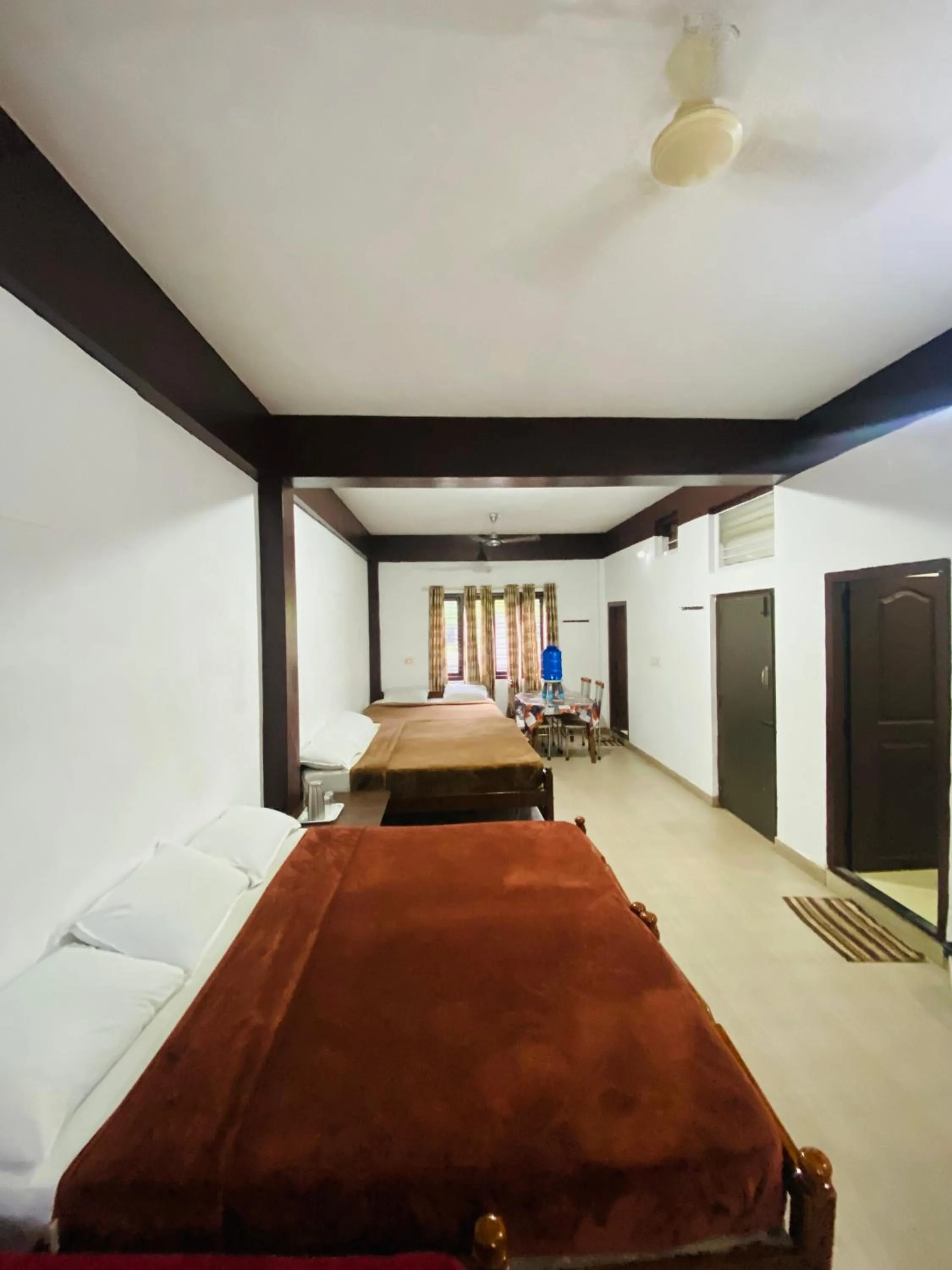 Bed in Hotel Caveri Inn