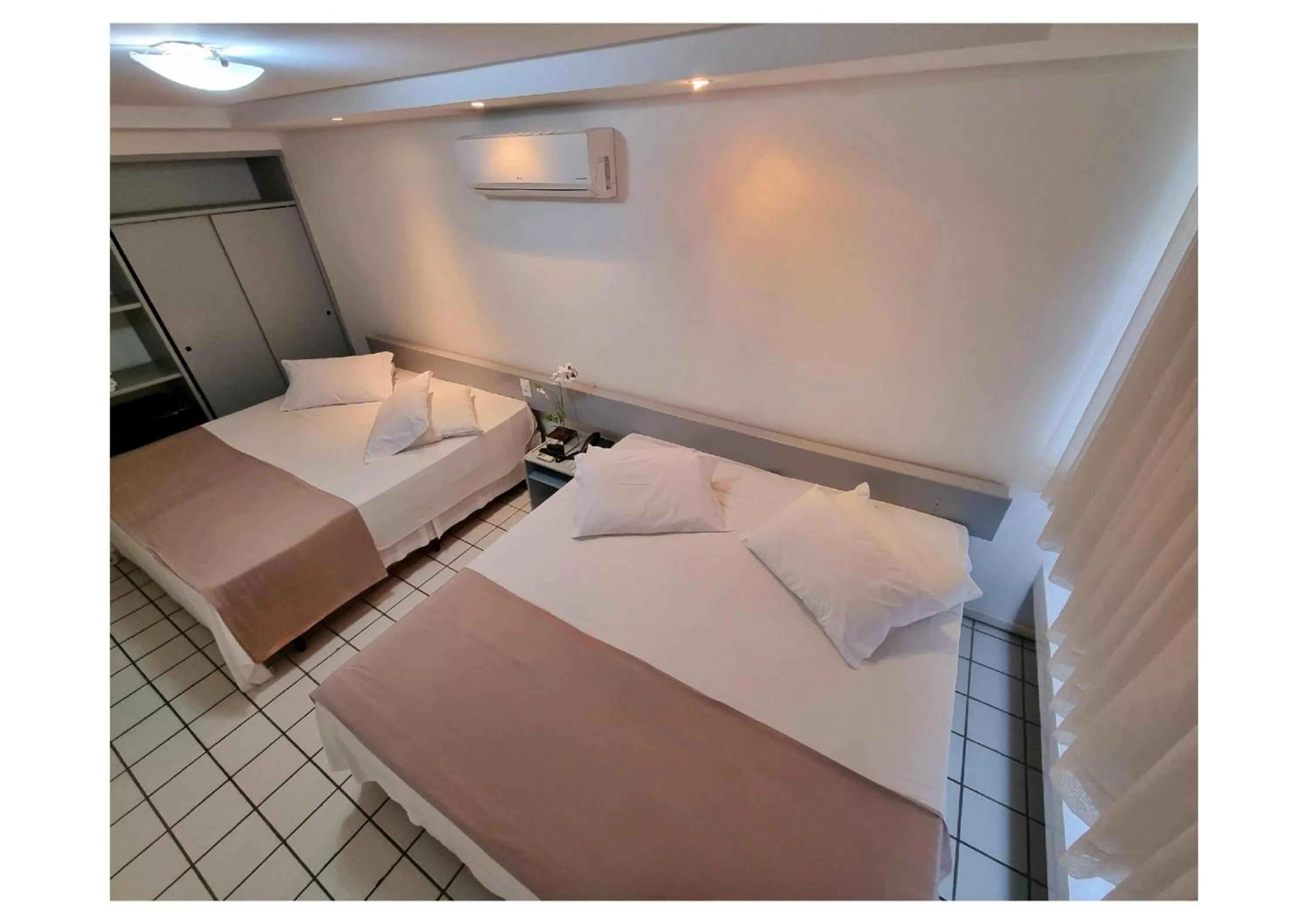 Standard Quadruple Room in Garanhuns Palace Hotel