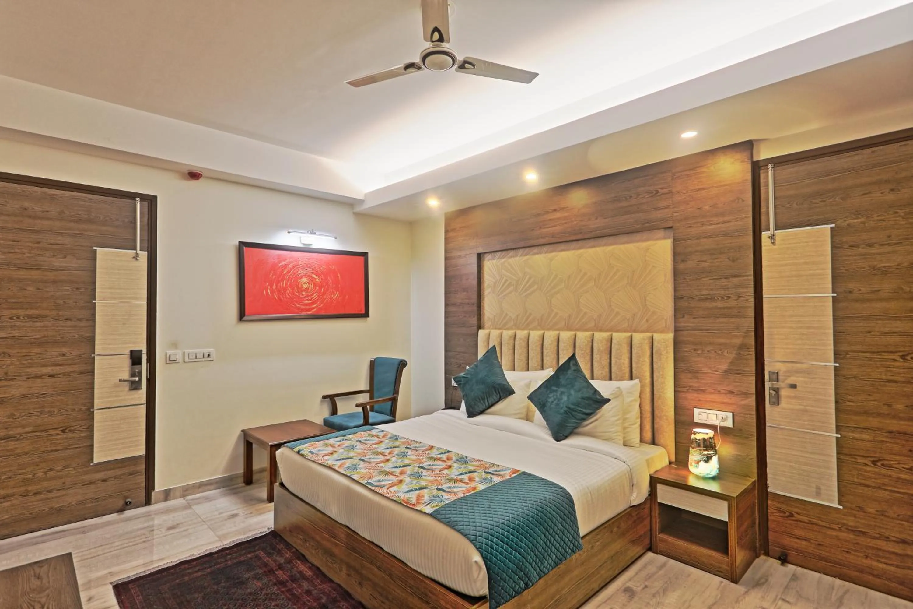 Bed in Hotel Cardinal Oxmo Delhi Airport