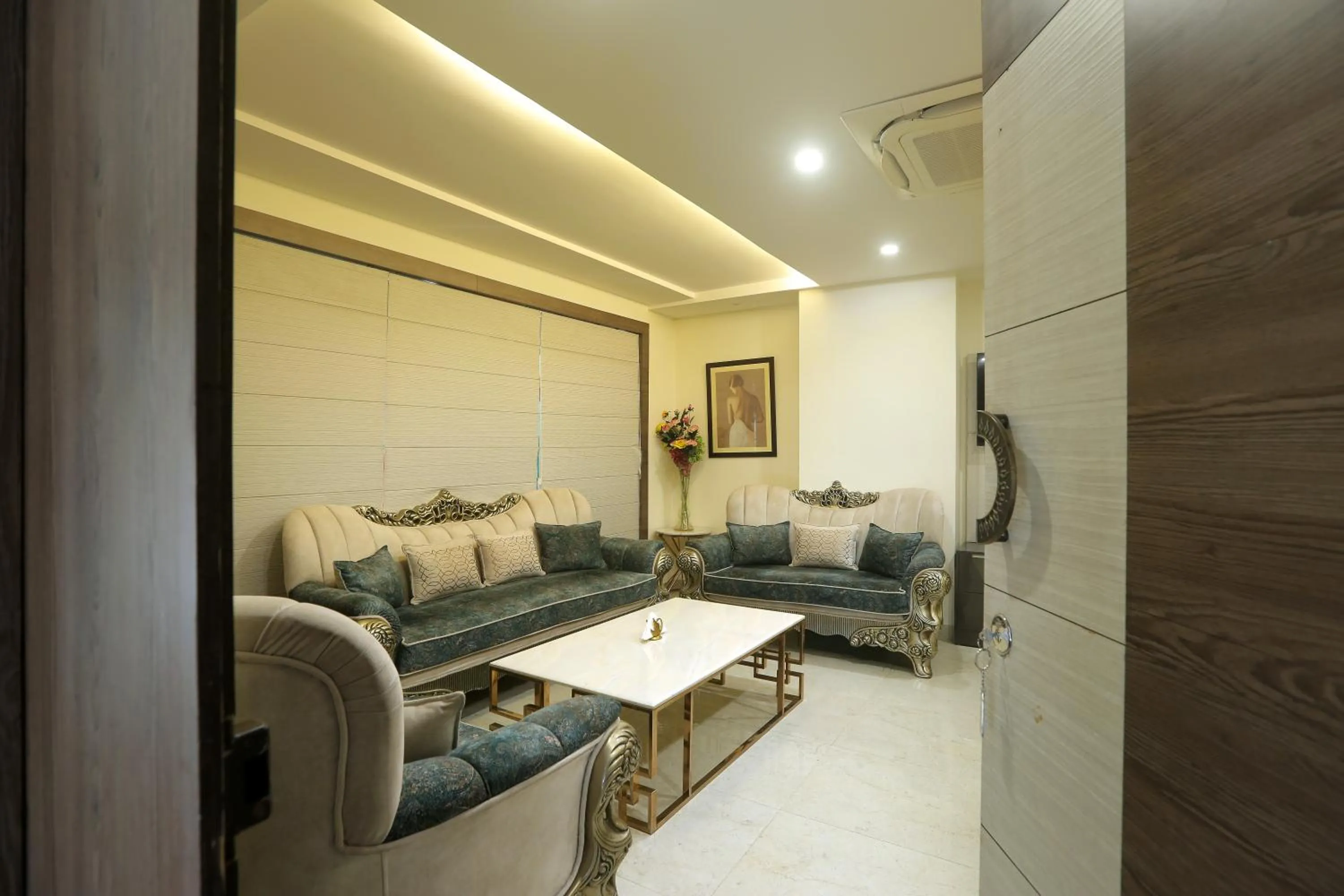 Seating area in Hotel Cardinal Oxmo Delhi Airport