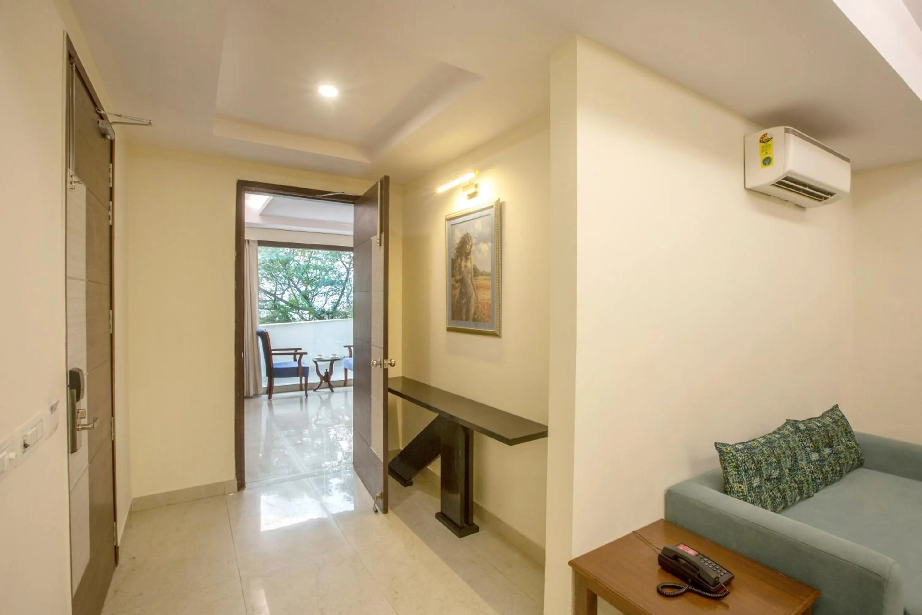 Seating area in Hotel Cardinal Oxmo Delhi Airport