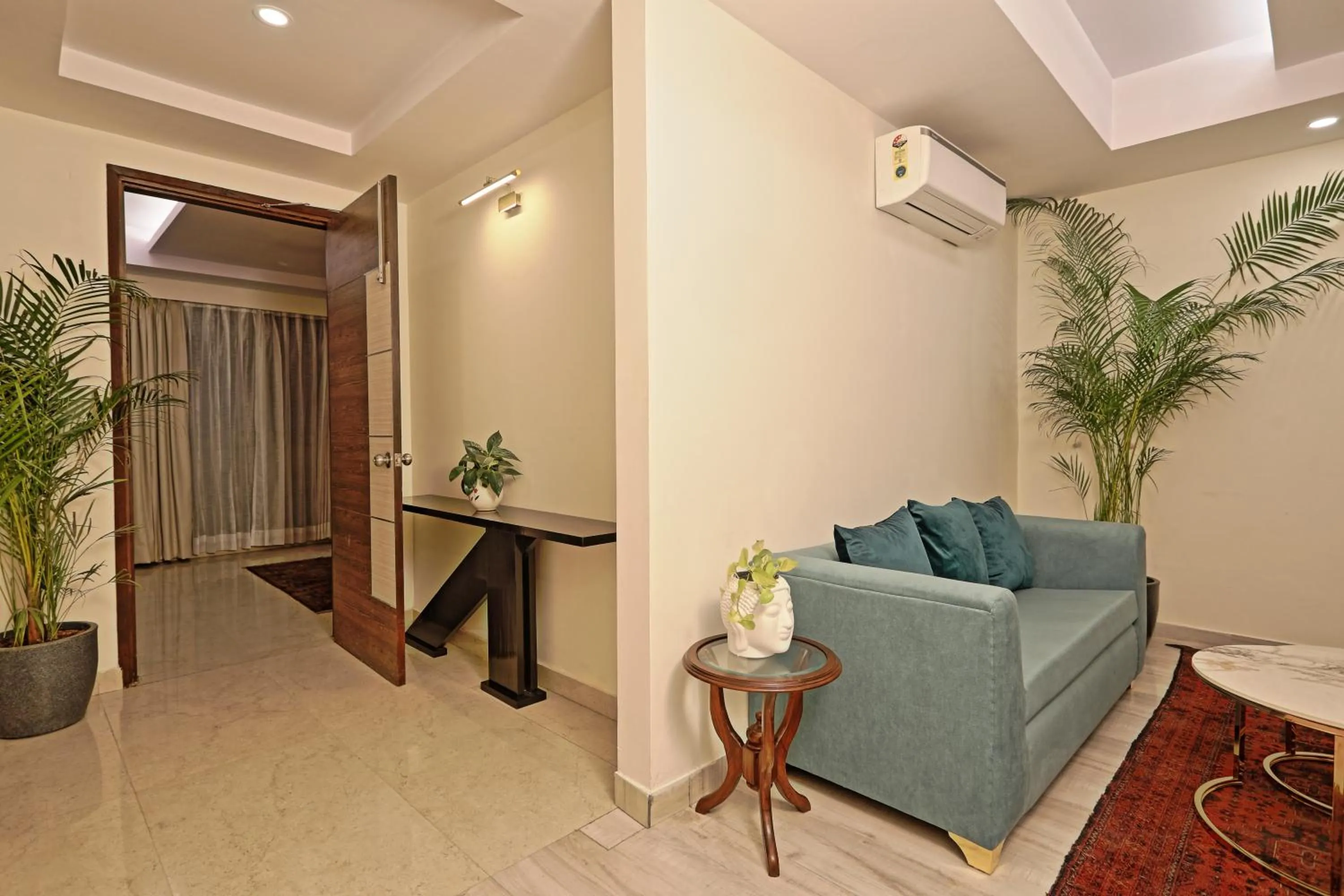 Seating area in Hotel Cardinal Oxmo Delhi Airport