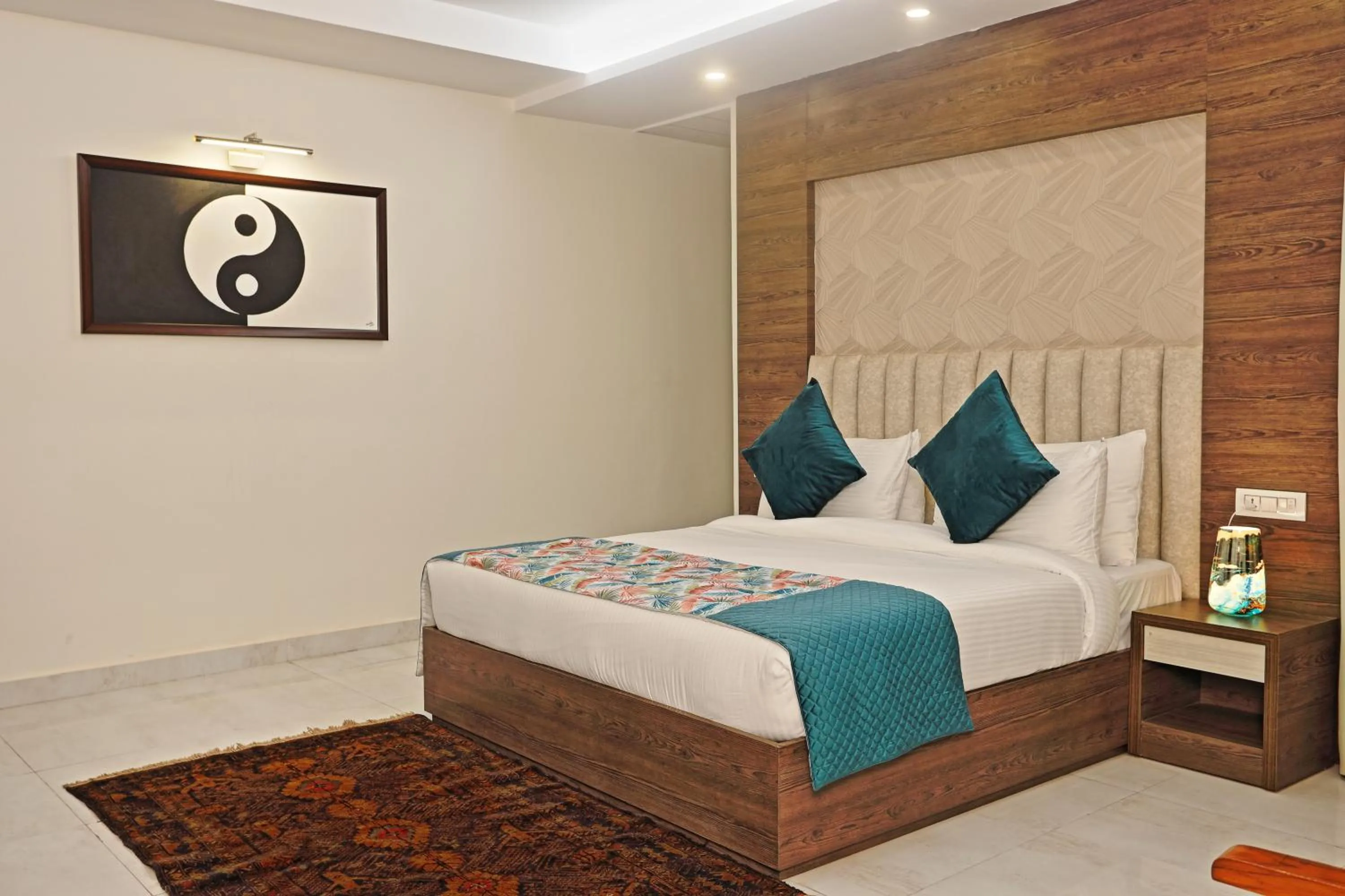 Bed in Hotel Cardinal Oxmo Delhi Airport