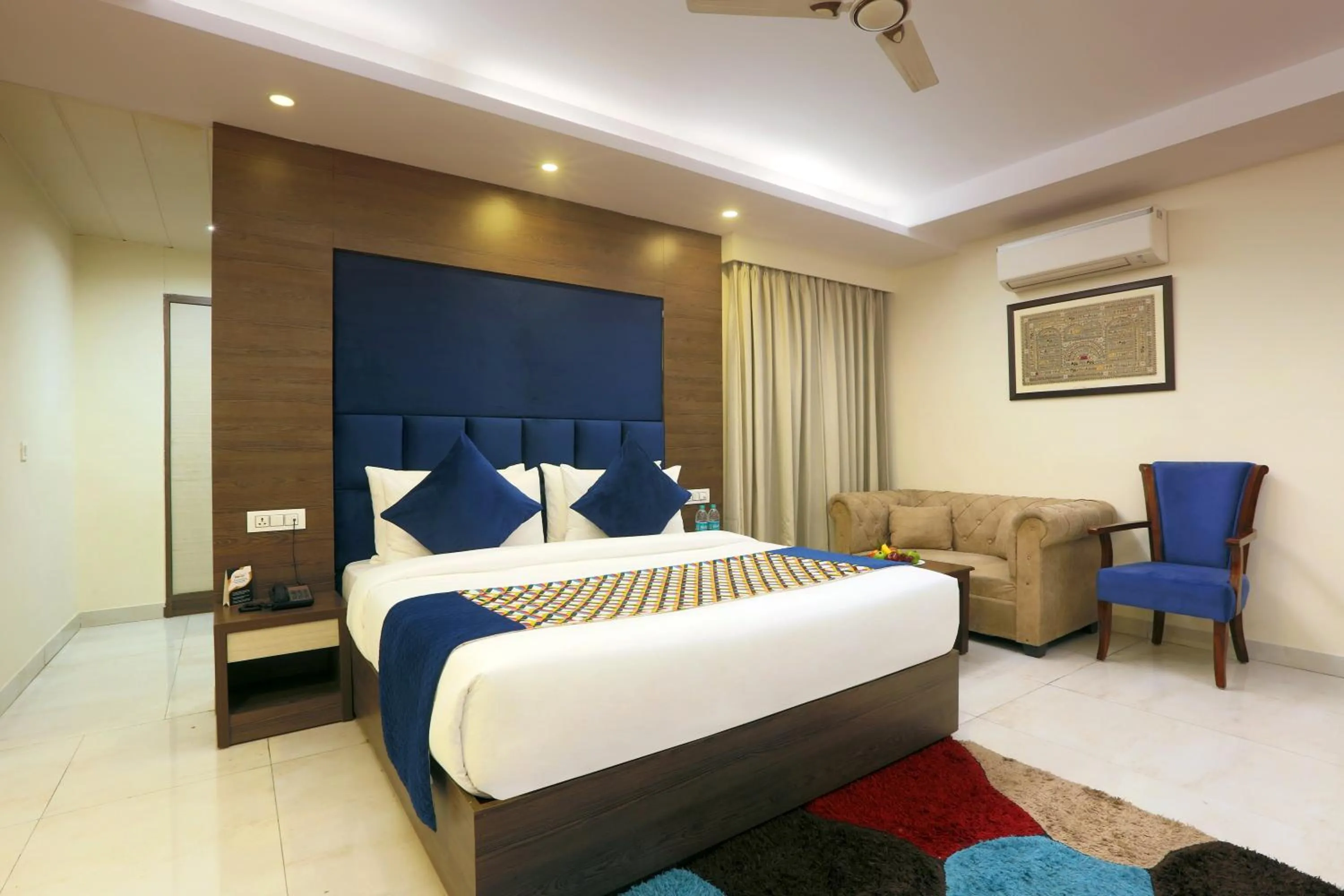 Bed in Hotel Cardinal Oxmo Delhi Airport