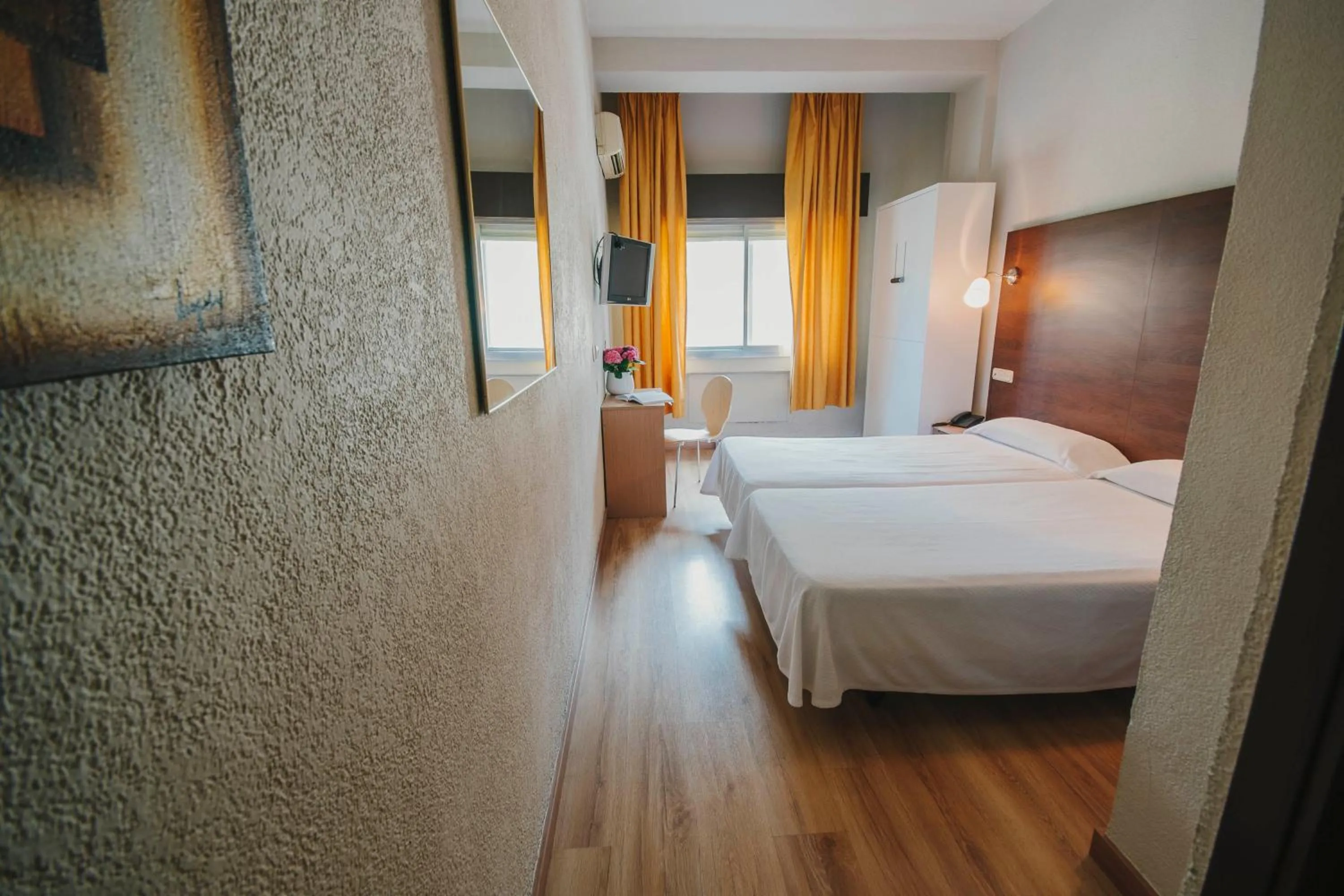 Bed in Hotel Embajador