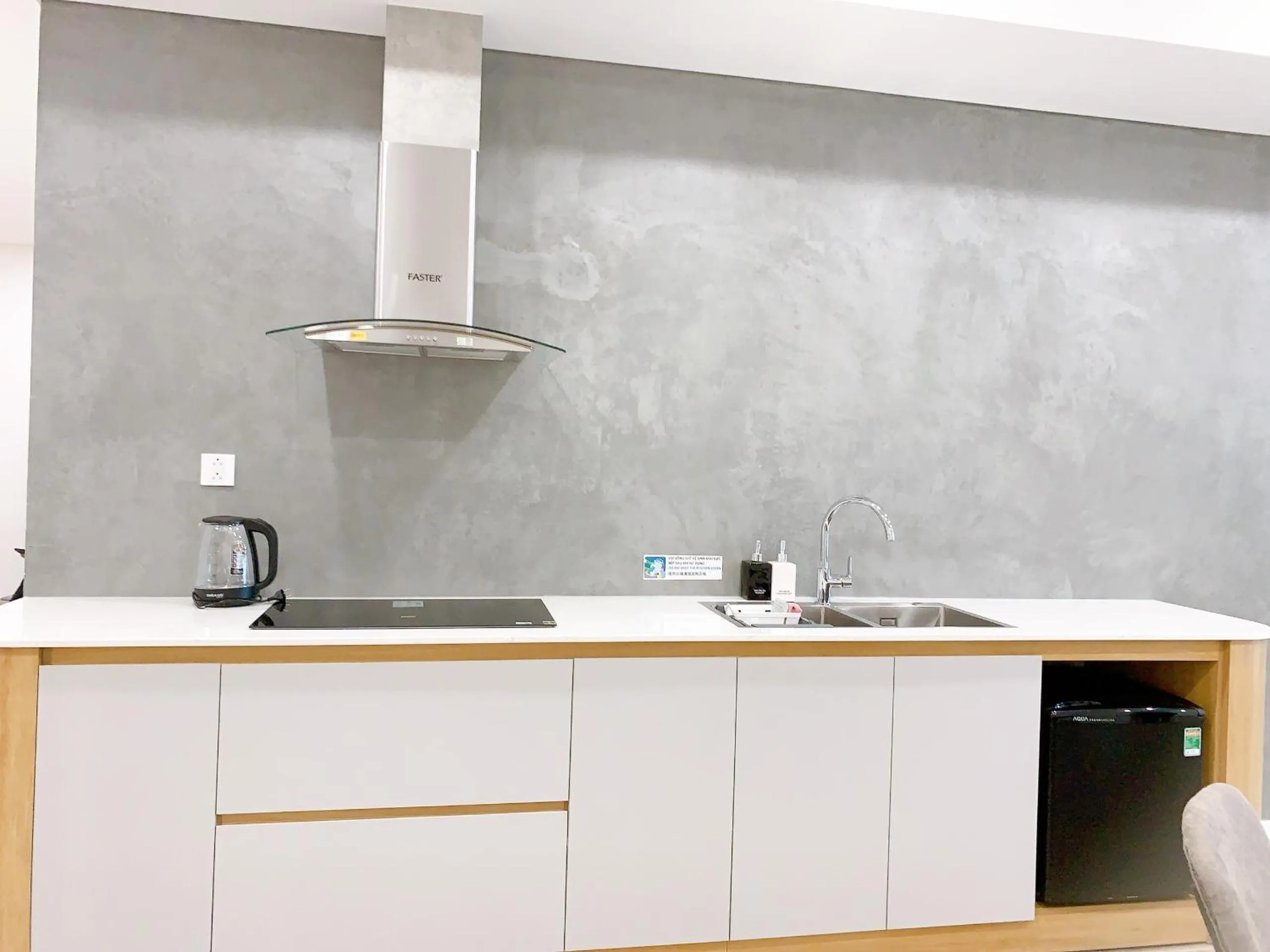 Kitchen or kitchenette in TSQ STAY Hotel Apartment