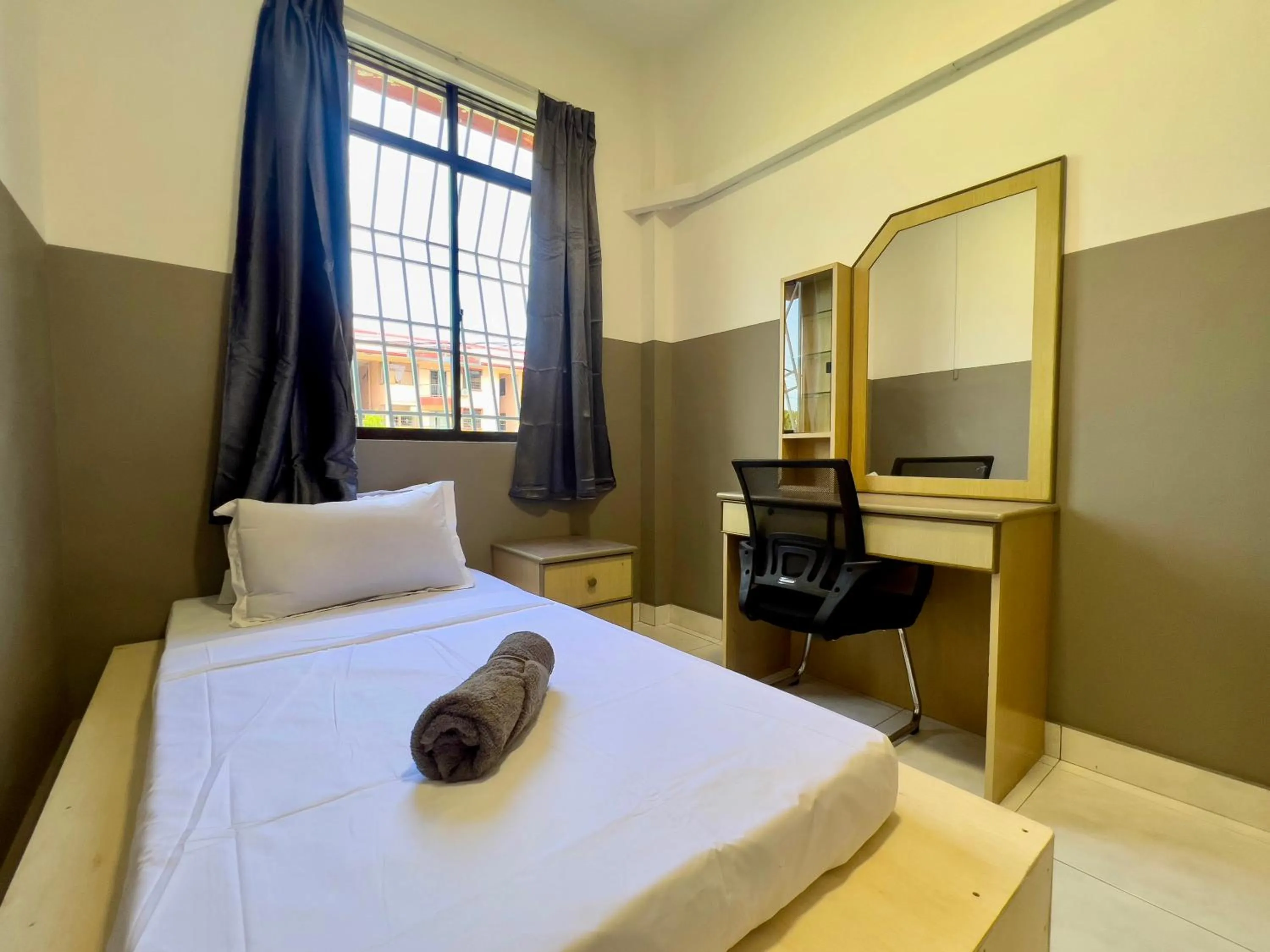 Bed in Hush Inn at Taman Penampang