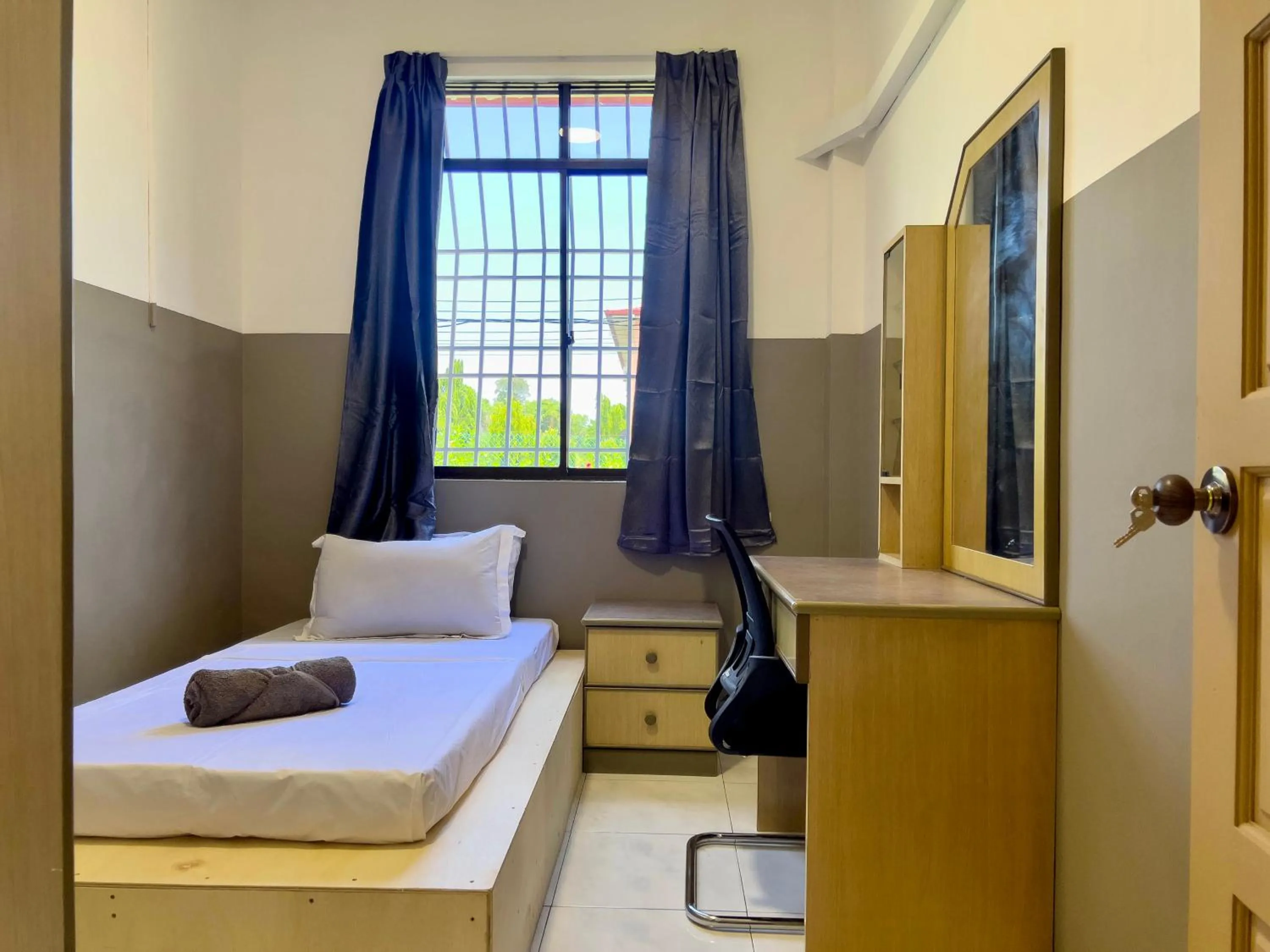 Bed in Hush Inn at Taman Penampang