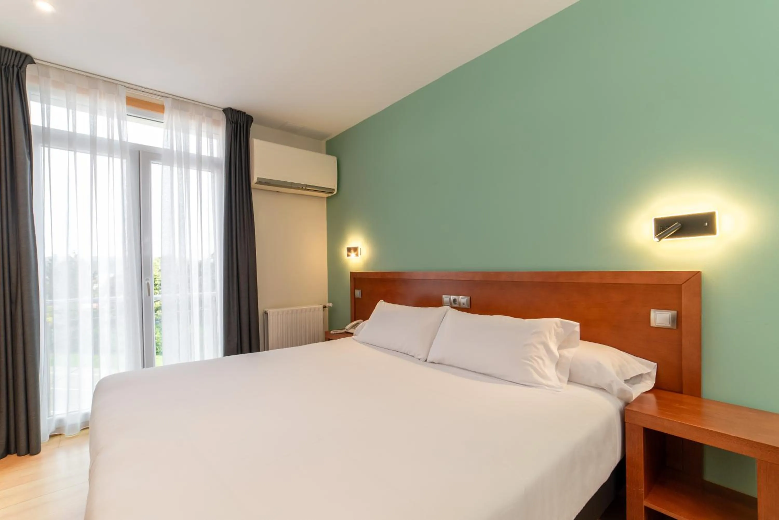 Bed in Hotel Playa Langosteira by Adeloló