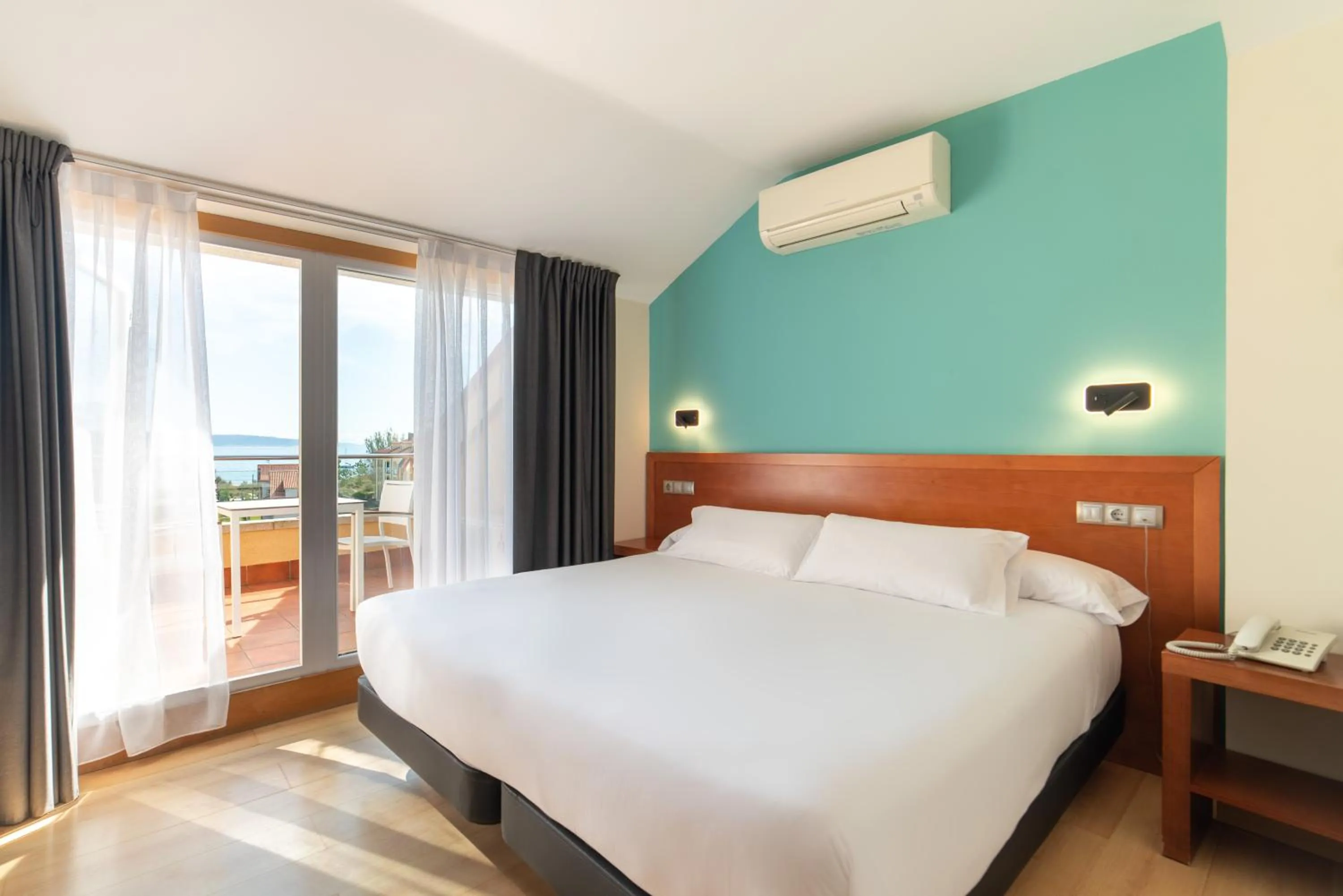 Bed in Hotel Playa Langosteira by Adeloló