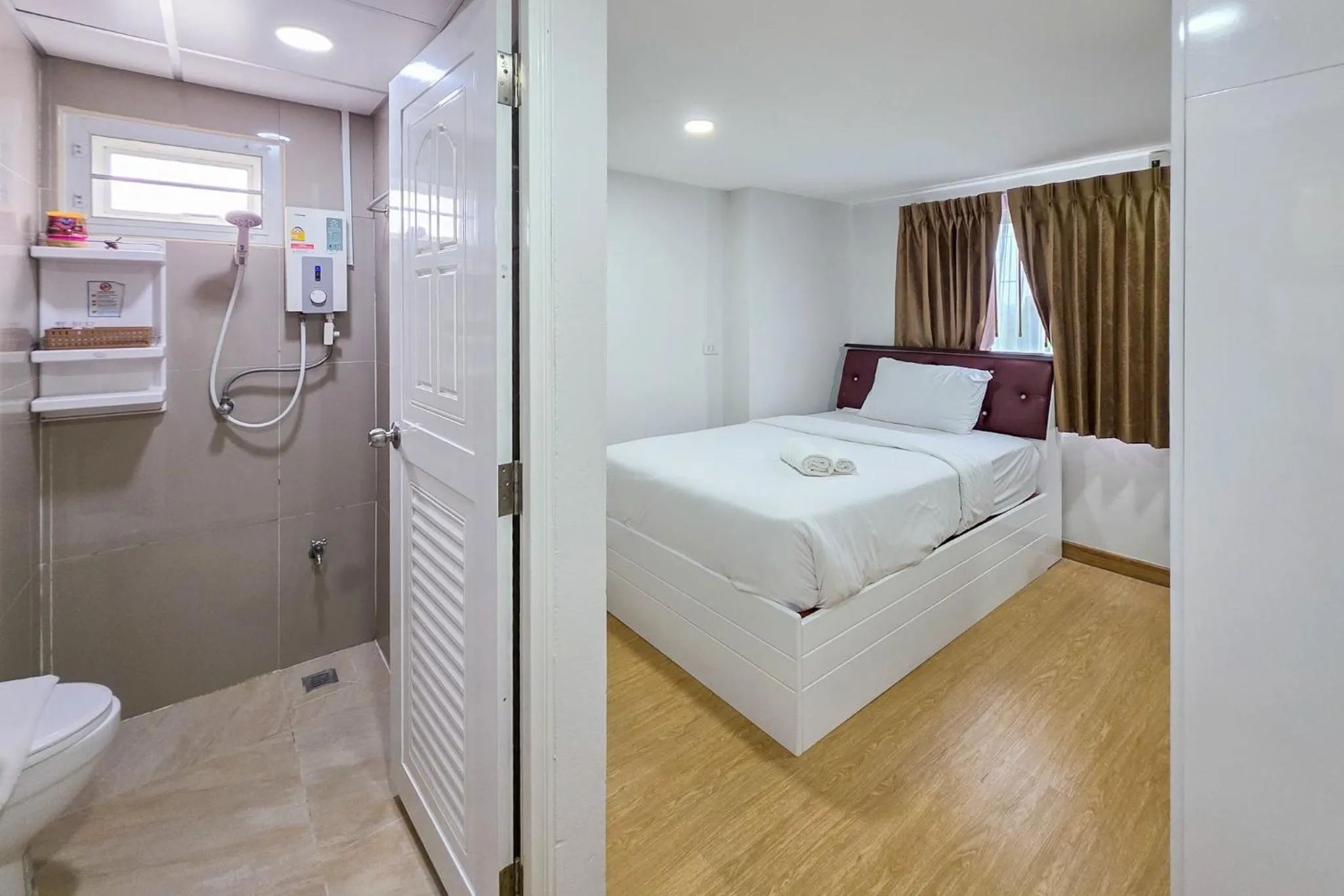 Bed in PT Grand Hotel