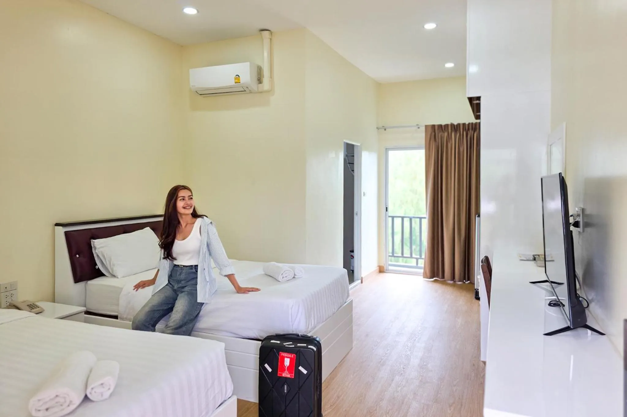 Bed in PT Grand Hotel