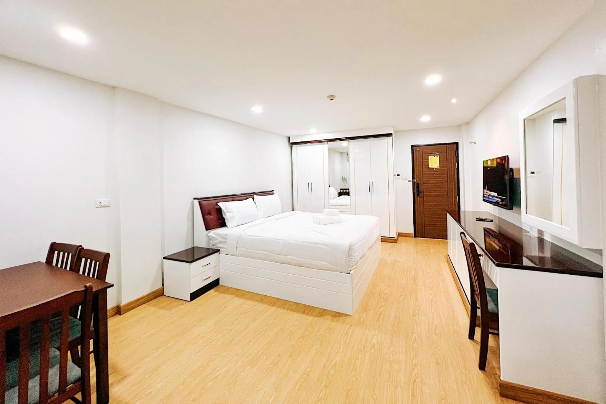 Bed in PT Grand Hotel