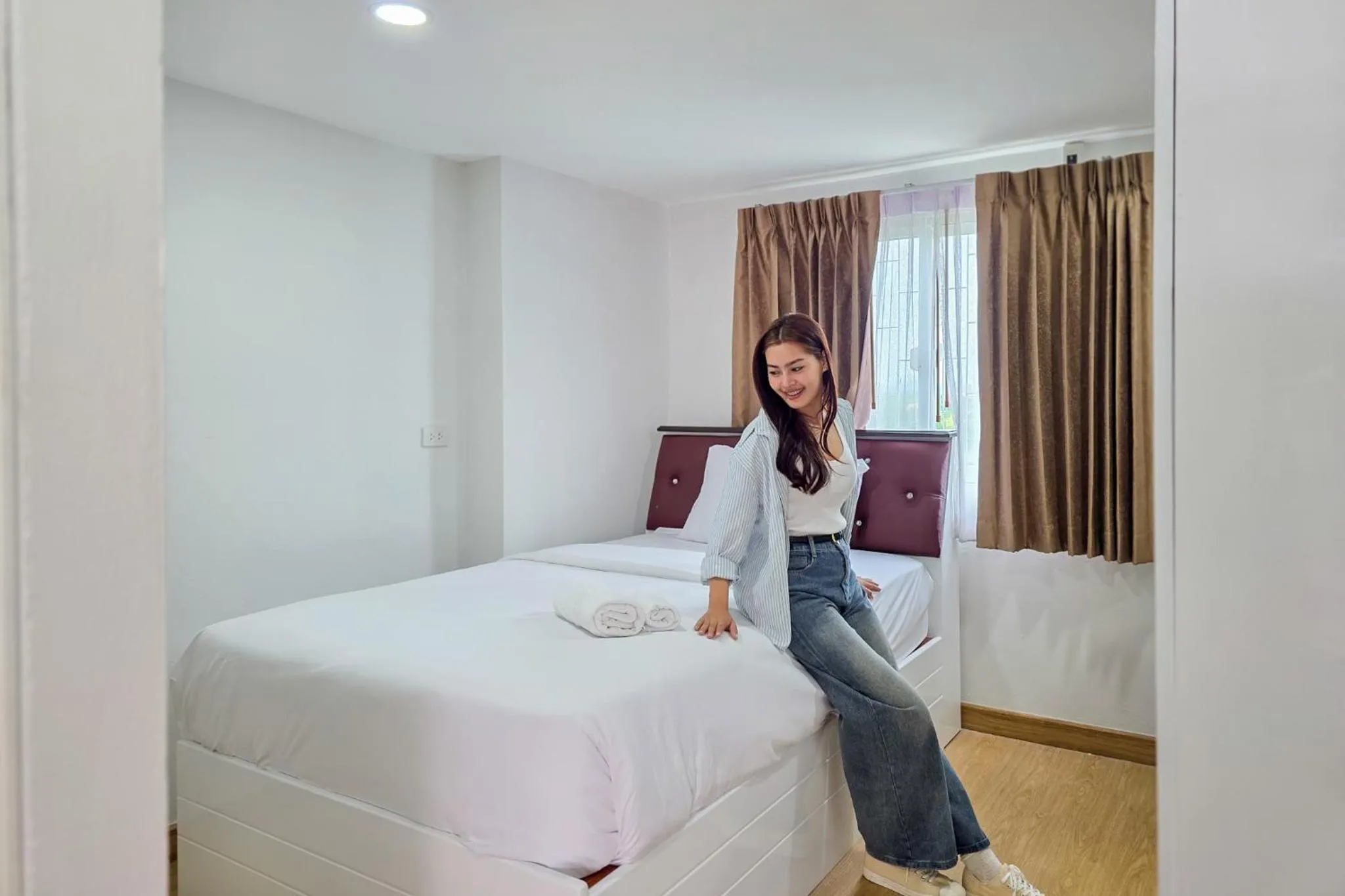 Bed in PT Grand Hotel