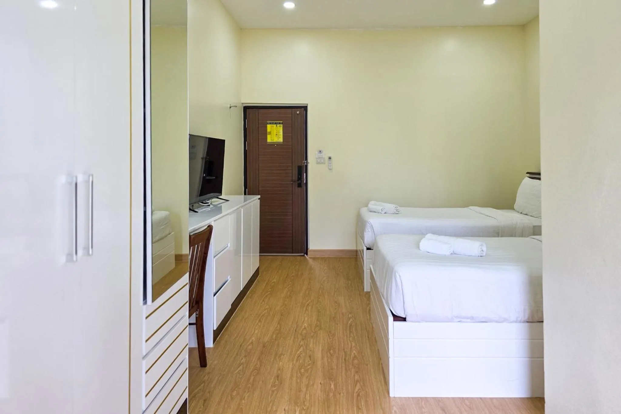 Bed in PT Grand Hotel