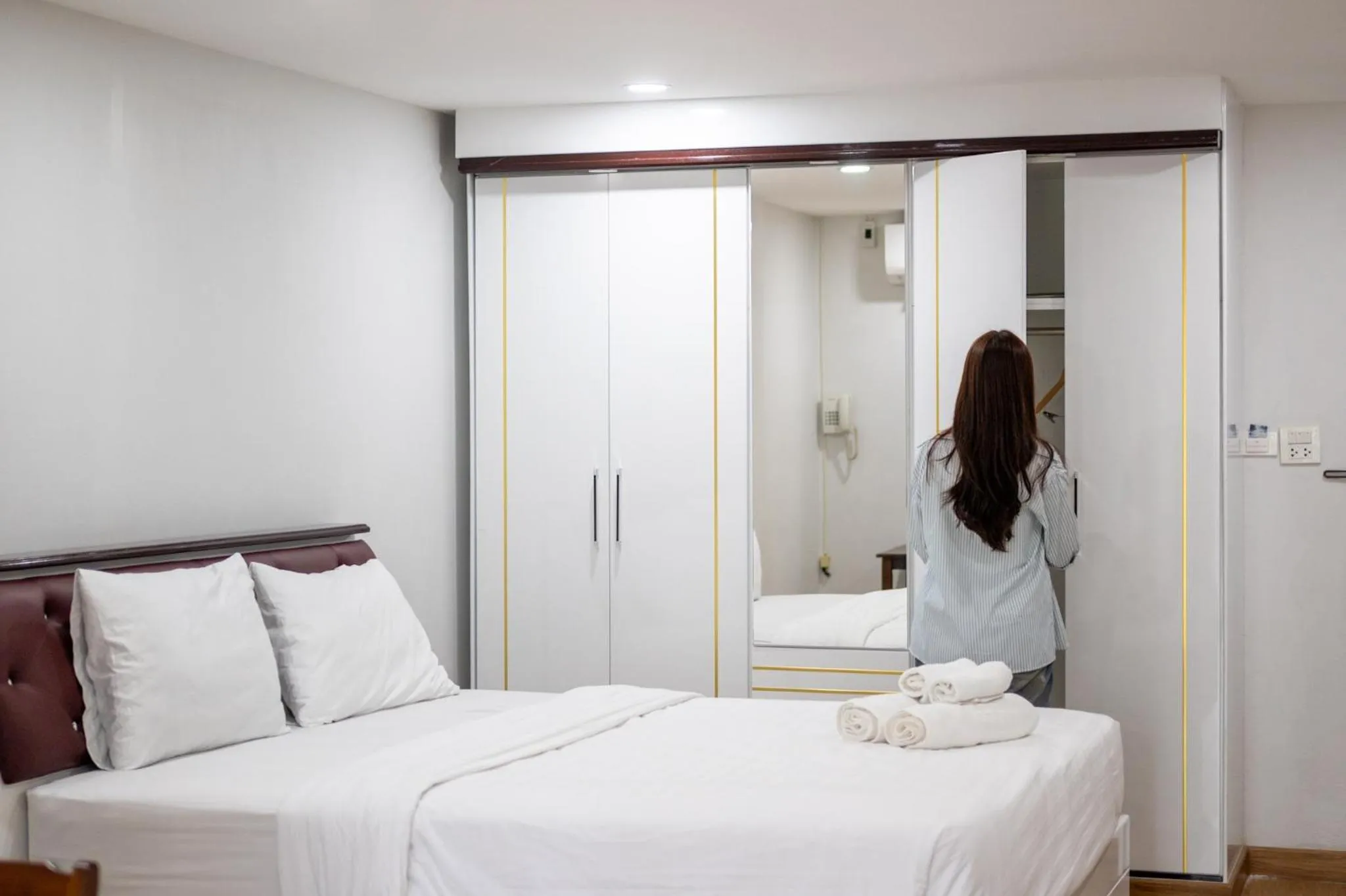 Bed in PT Grand Hotel