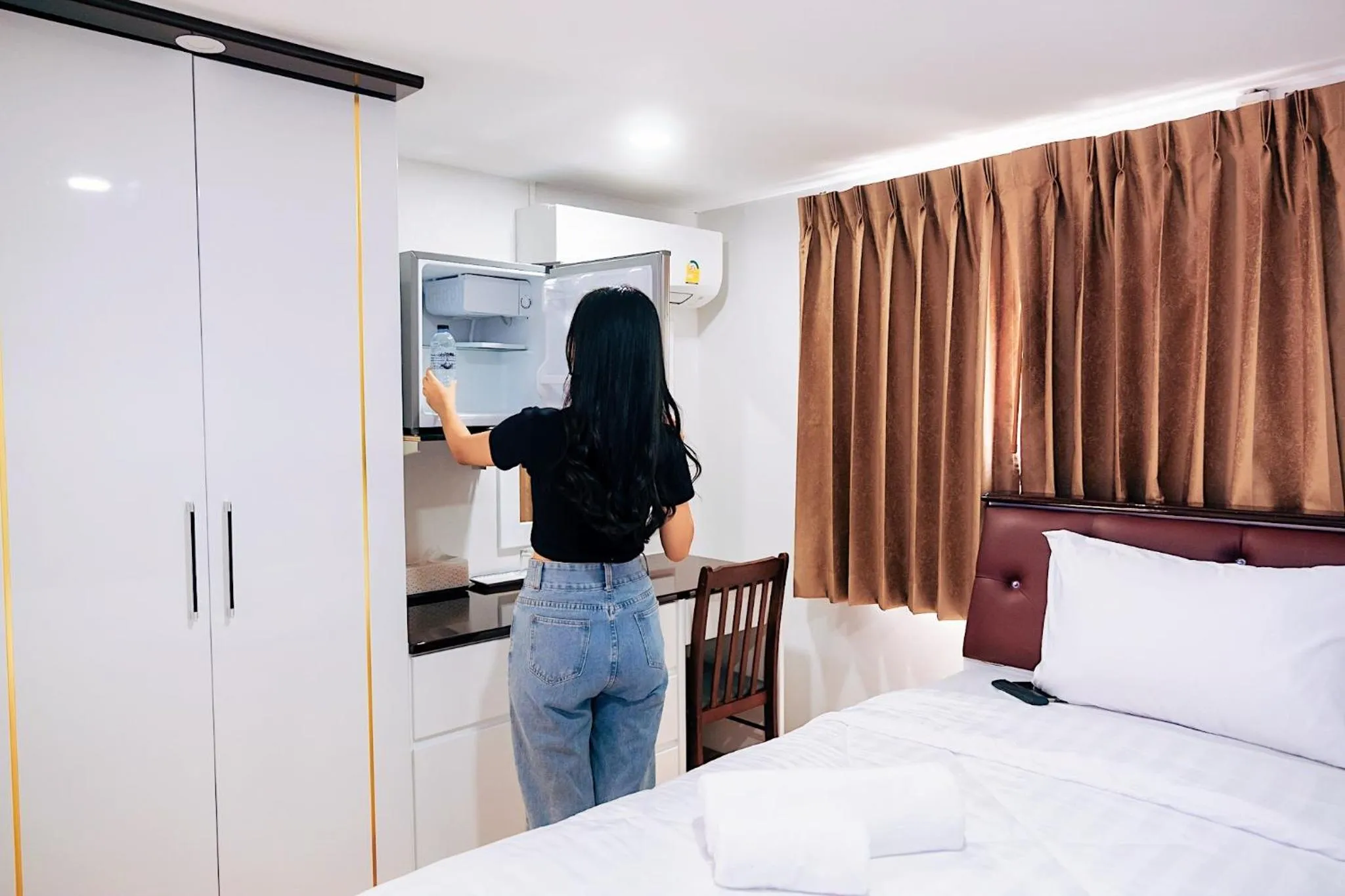 Bed in PT Grand Hotel