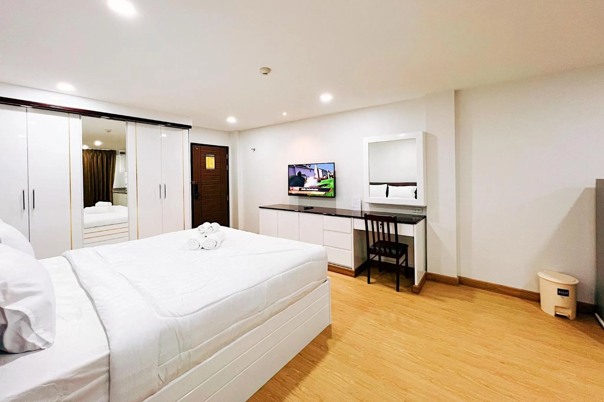 Bed in PT Grand Hotel