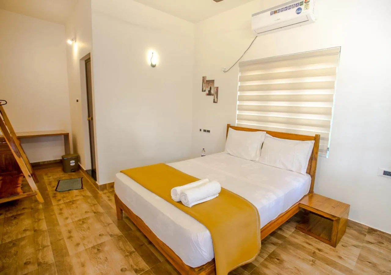 Toilet, Bed in Ocean View Beach Villa Varkala by VOYE HOMES