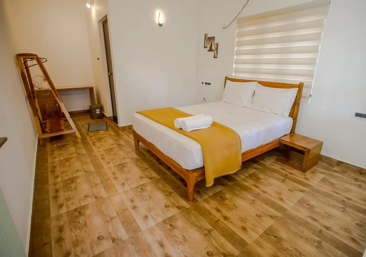 Bed in Ocean View Beach Villa Varkala by VOYE HOMES