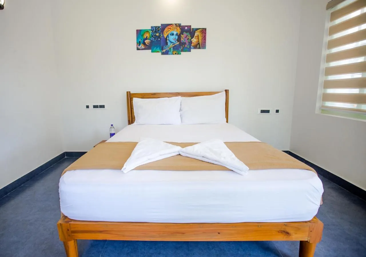 Bed in Ocean View Beach Villa Varkala by VOYE HOMES