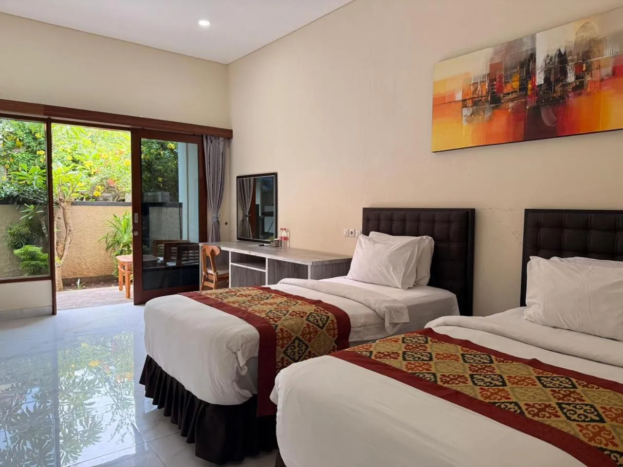 Bed in THE LAVIANA HOTEL