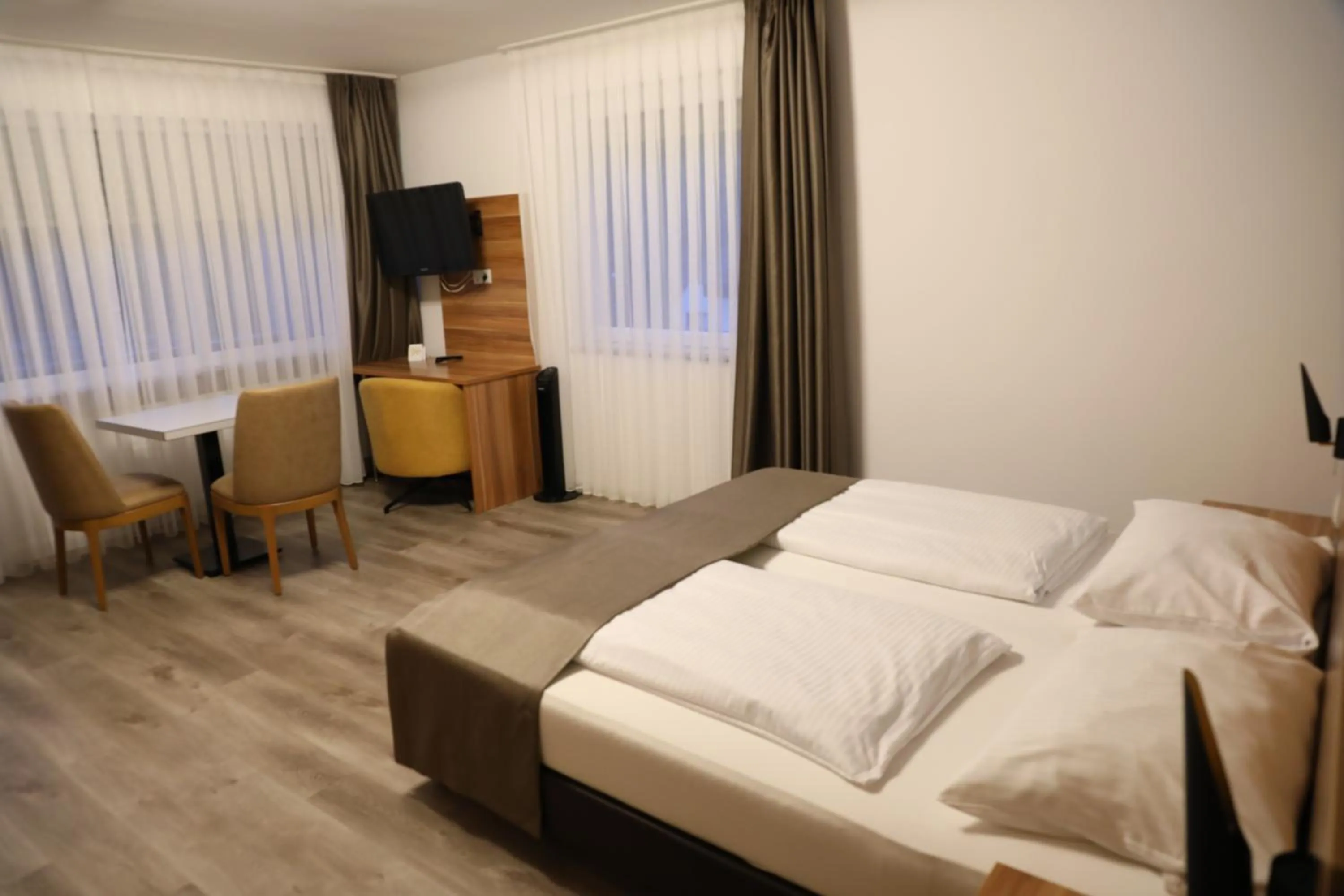 Bed in Hotel Schlangenbader Hof