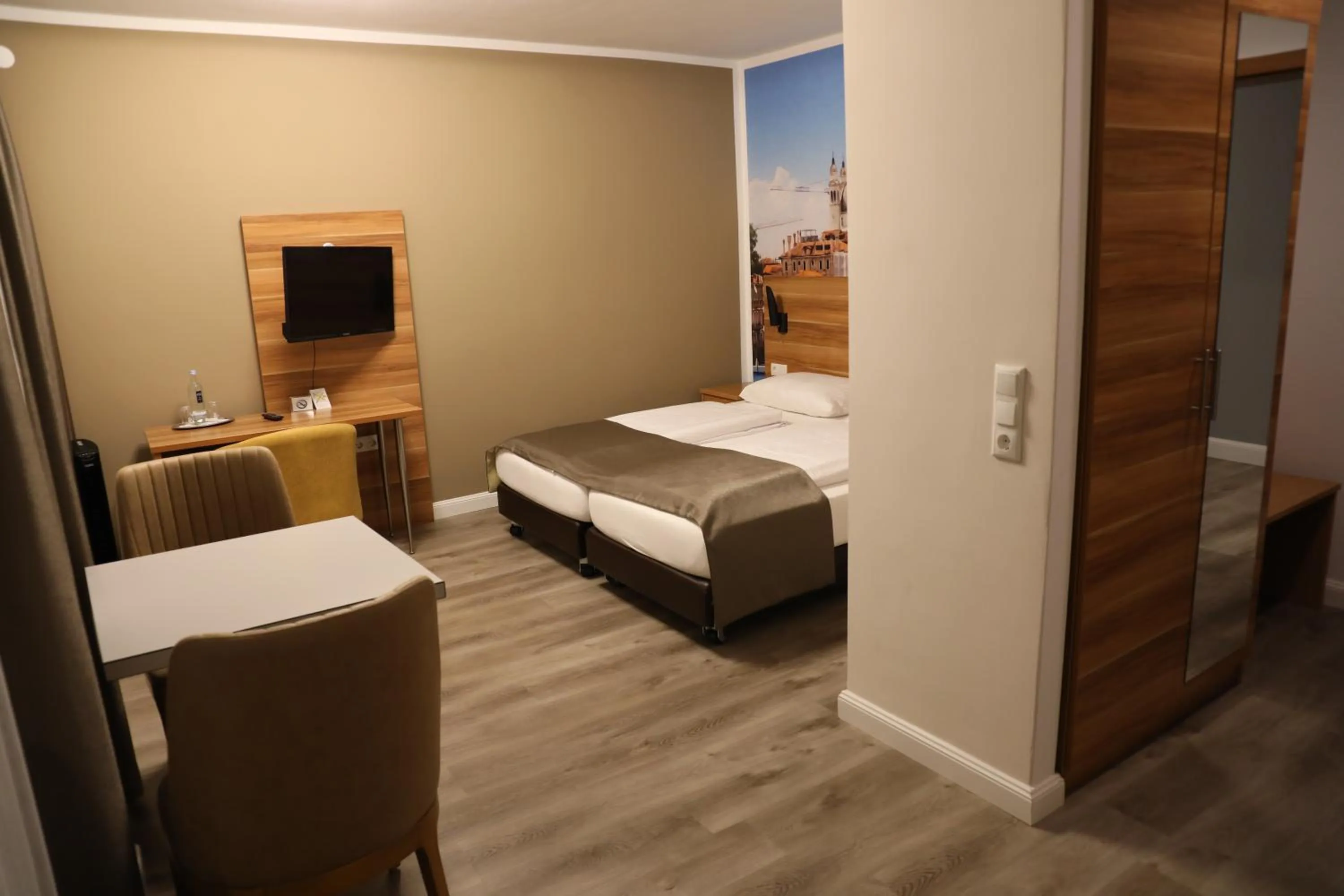 Seating area, Bed in Hotel Schlangenbader Hof