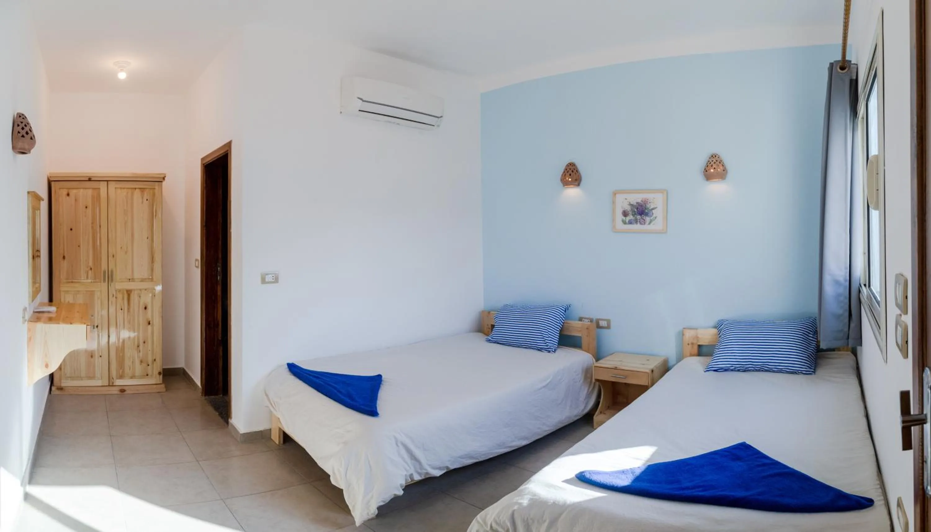 Bed in Al Deira Dahab Hotel