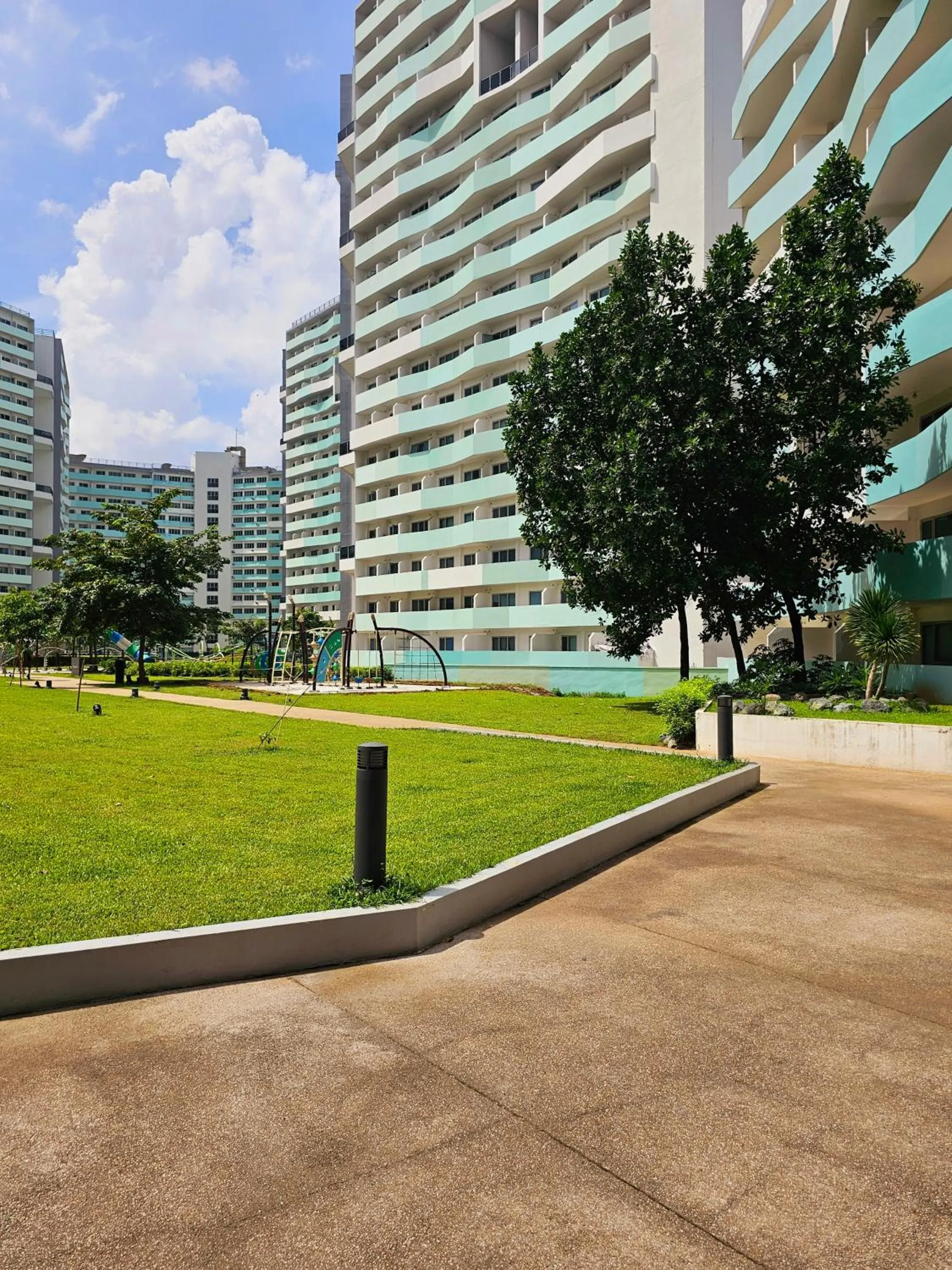 Property building in Acellyne's Suites at The Residences at Commonwealth by Century