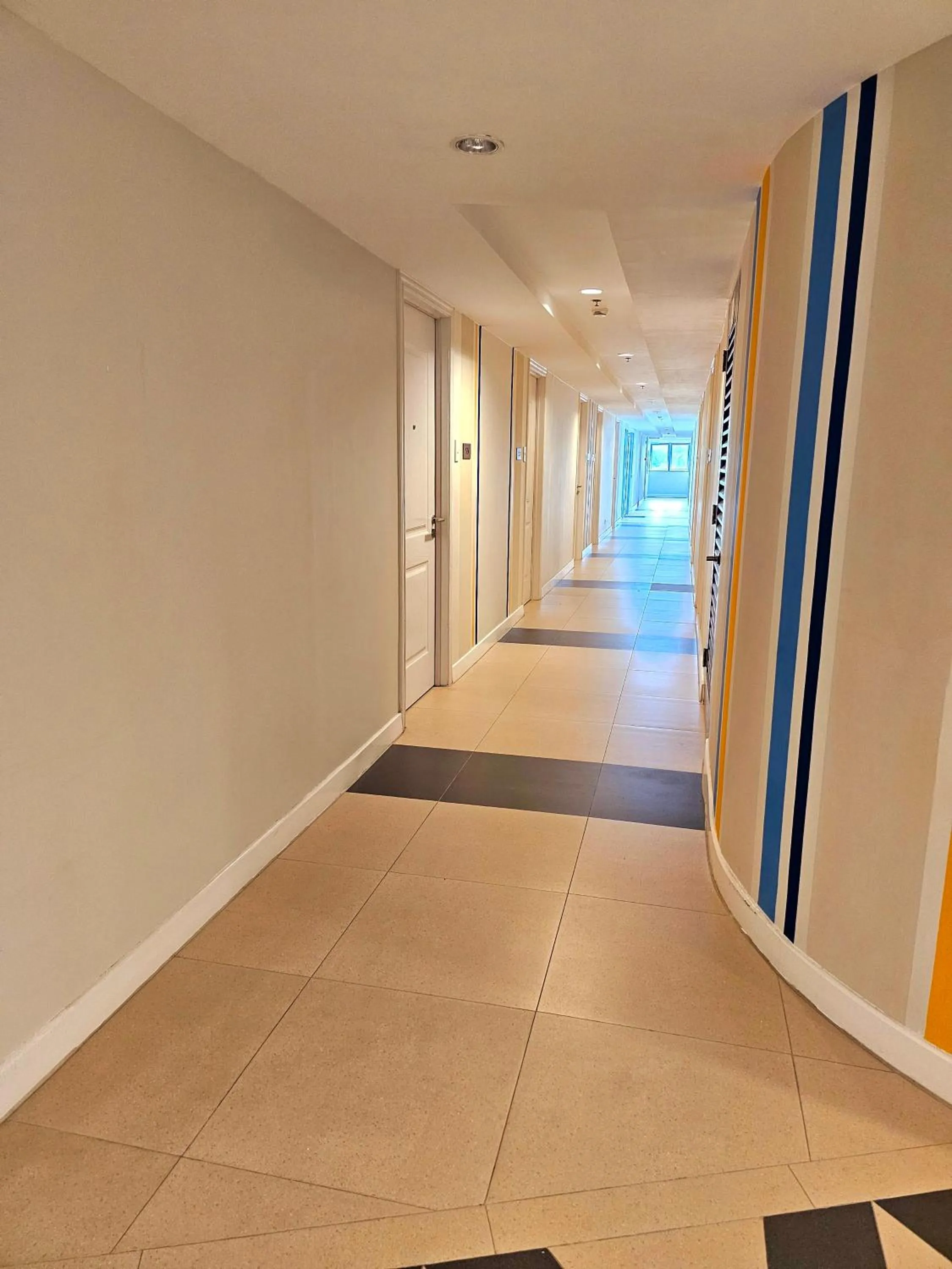 Property building in Acellyne's Suites at The Residences at Commonwealth by Century