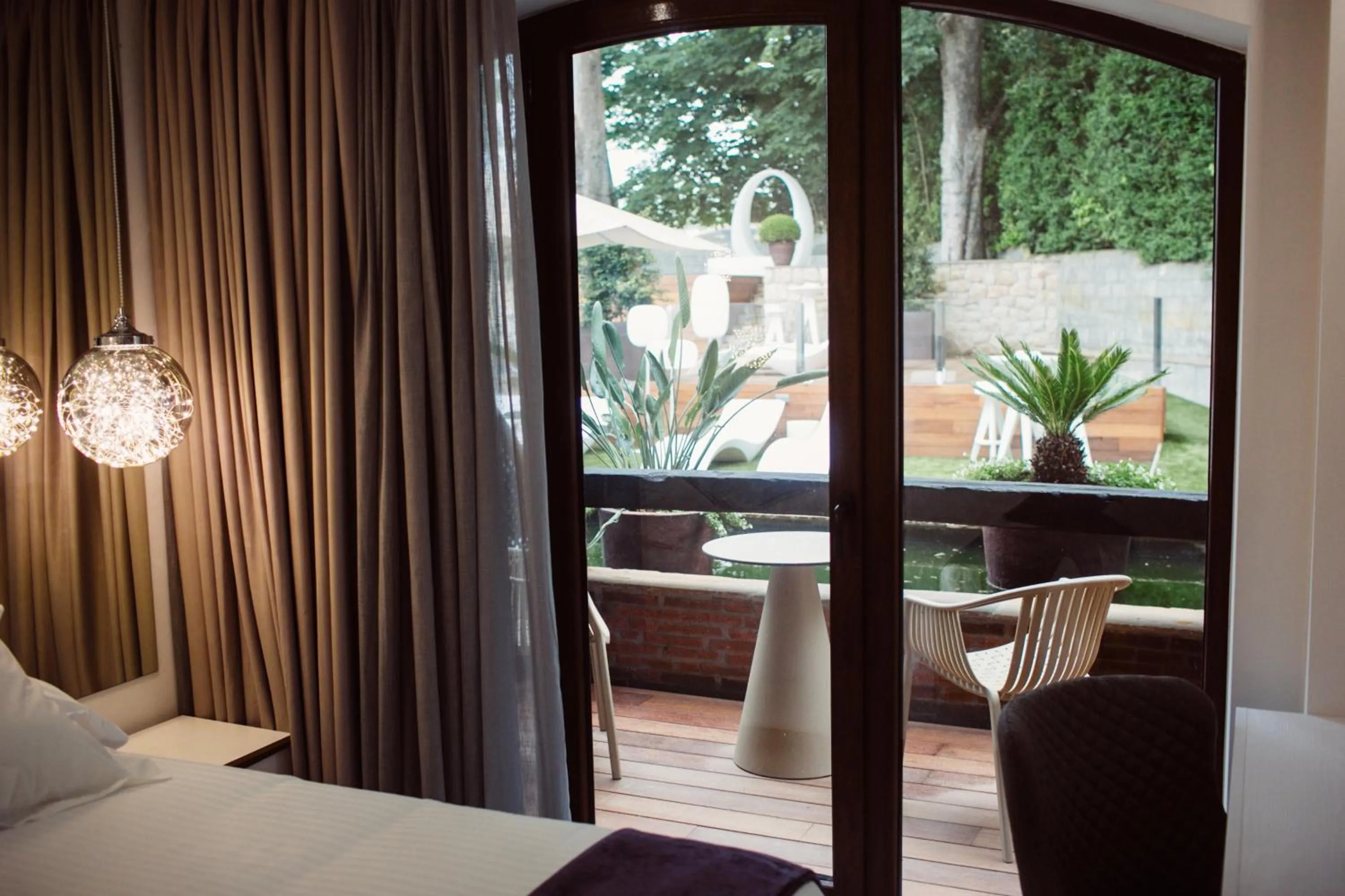 Balcony/Terrace, Bed in Hotel Cuevas - Adults Only