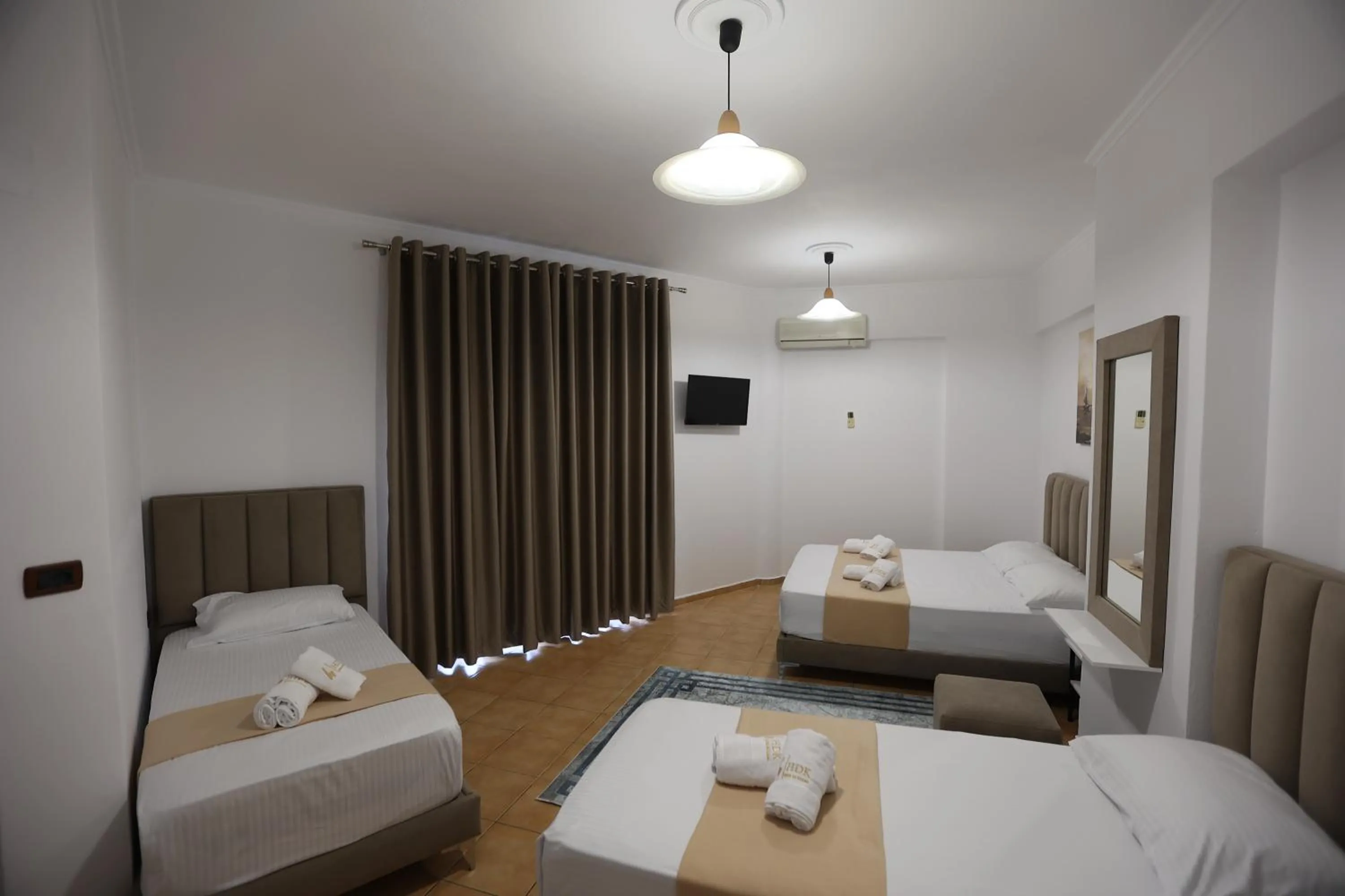 Bed in Hotel de Ksamil