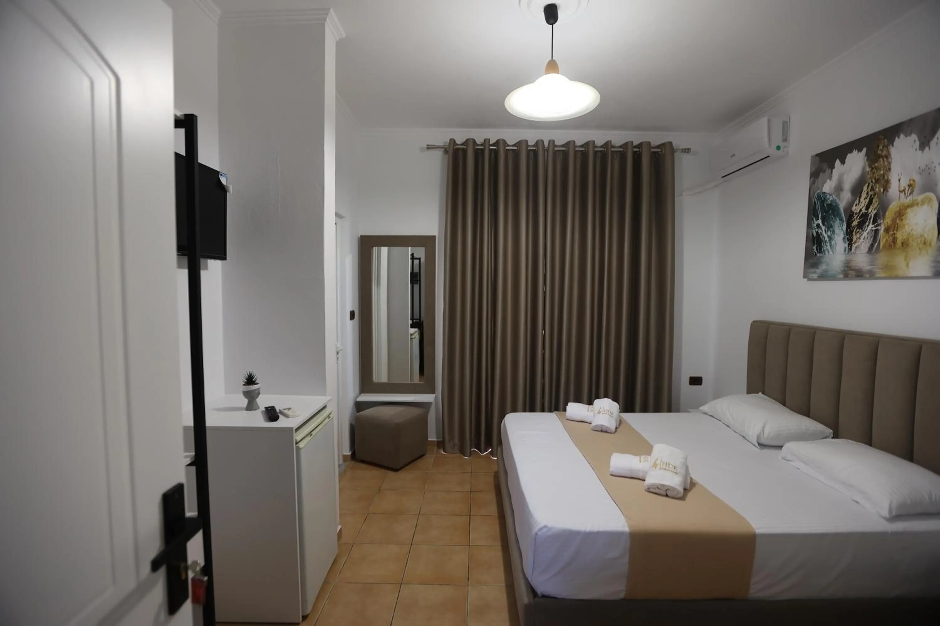 Bed in Hotel de Ksamil