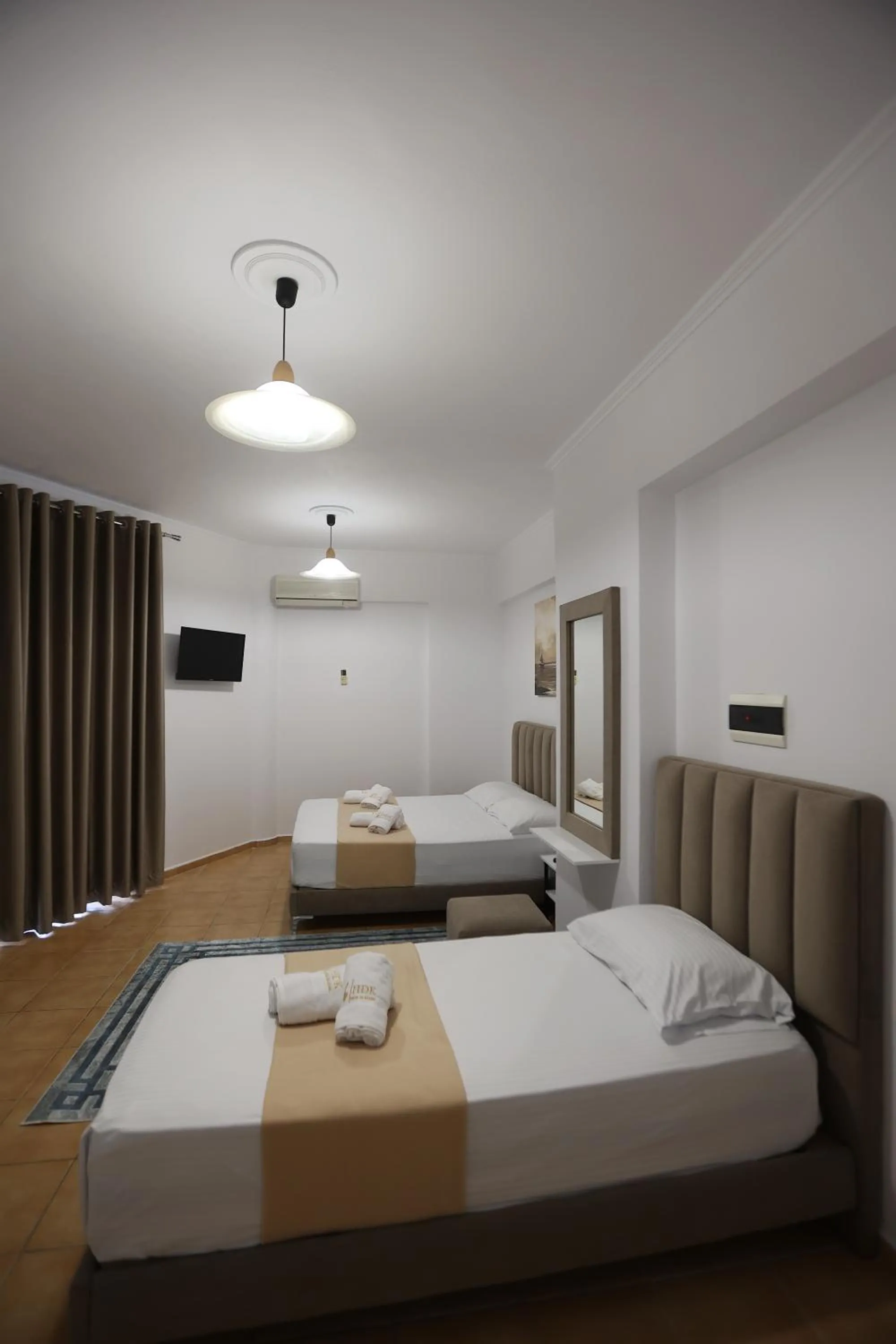 Bed in Hotel de Ksamil