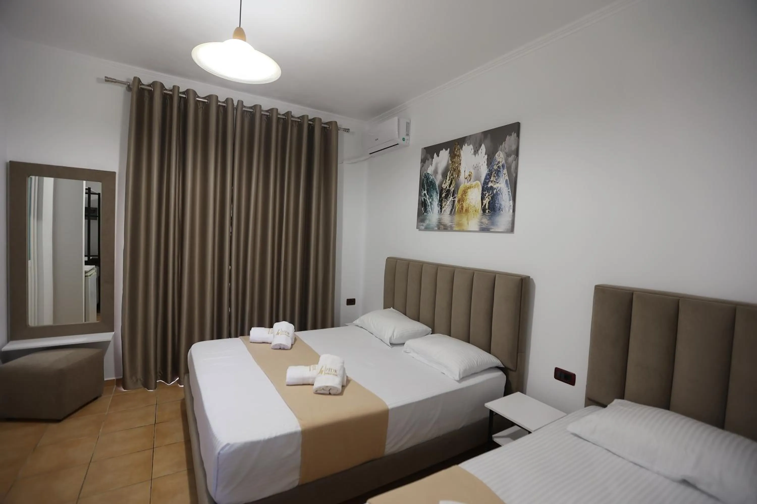 Bed in Hotel de Ksamil