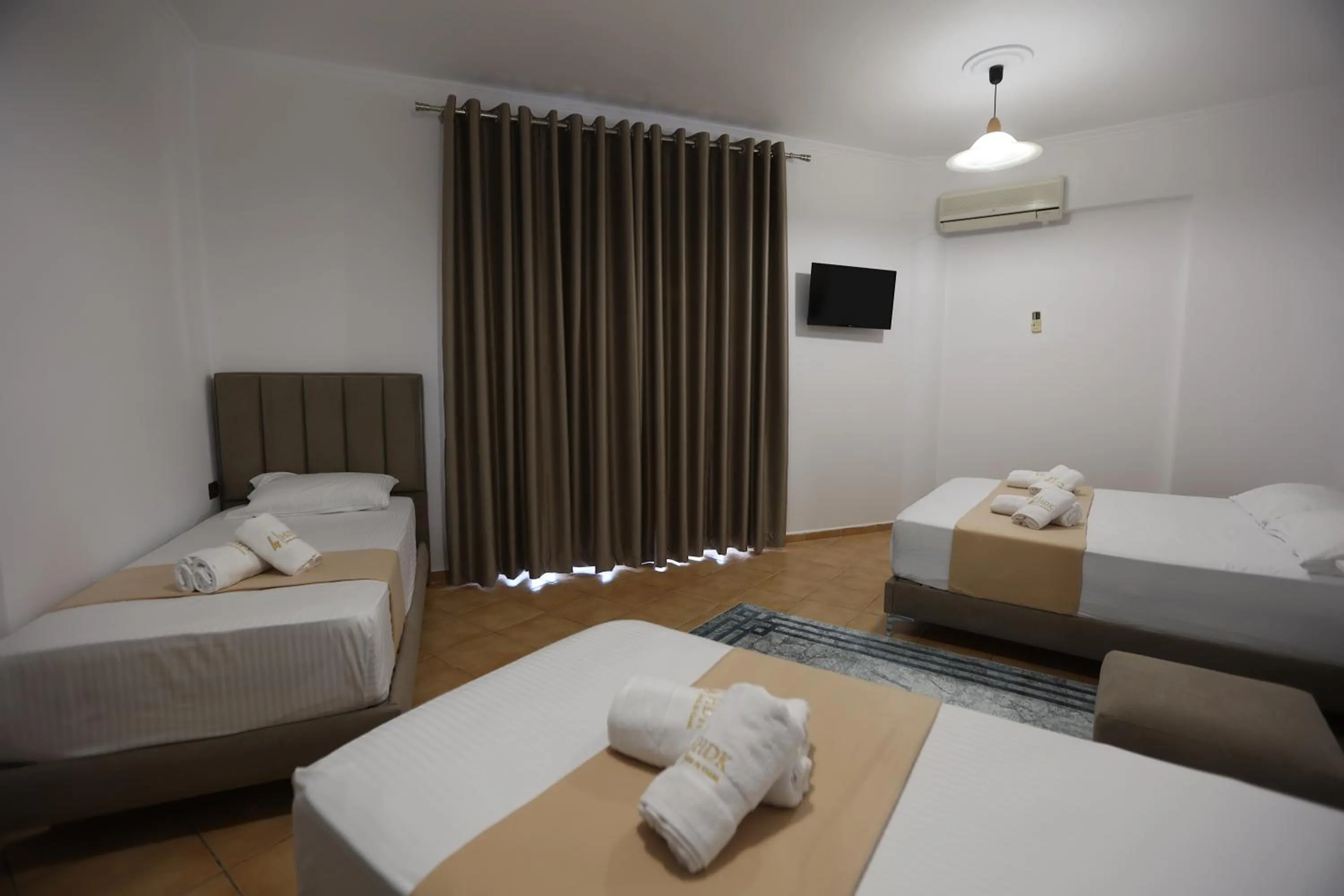 Bed in Hotel de Ksamil
