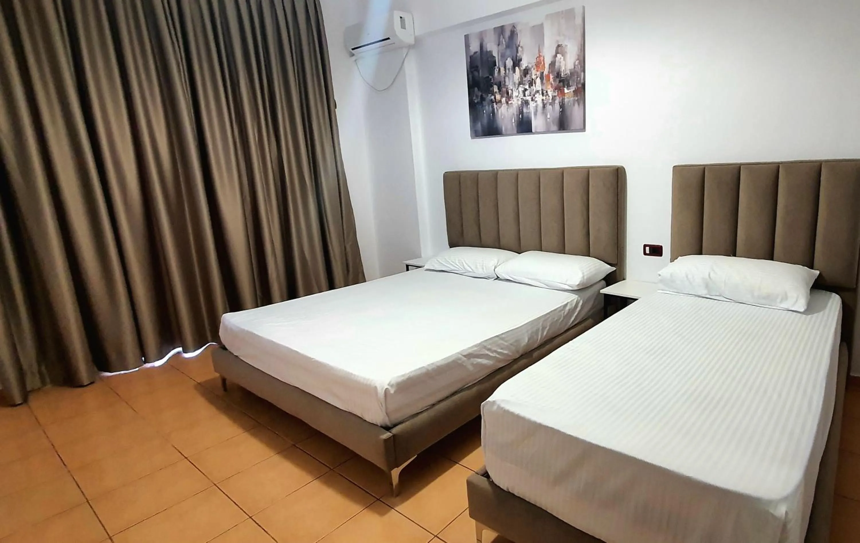 Bed in Hotel de Ksamil