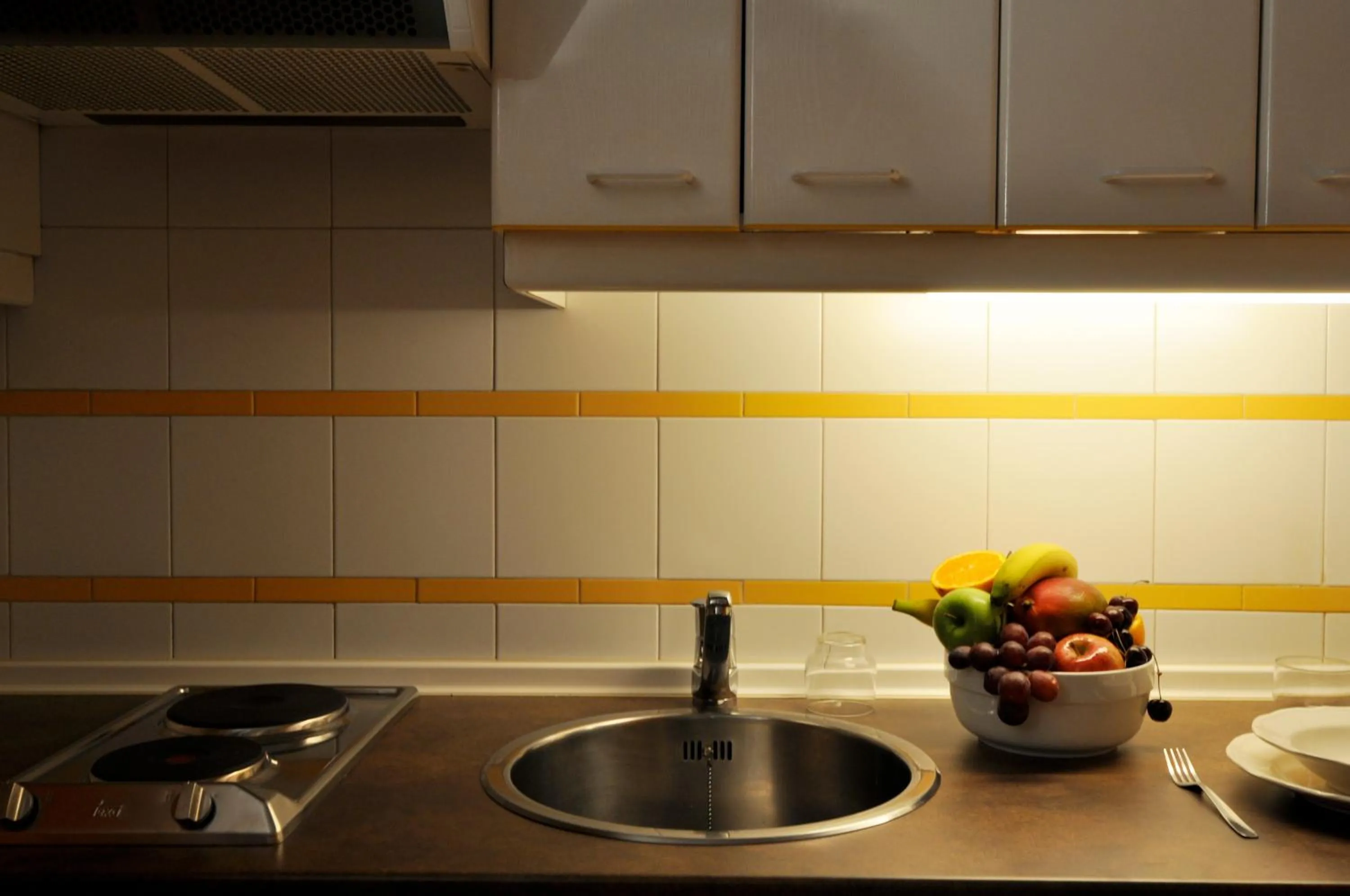 Kitchen or kitchenette in Suite Prado