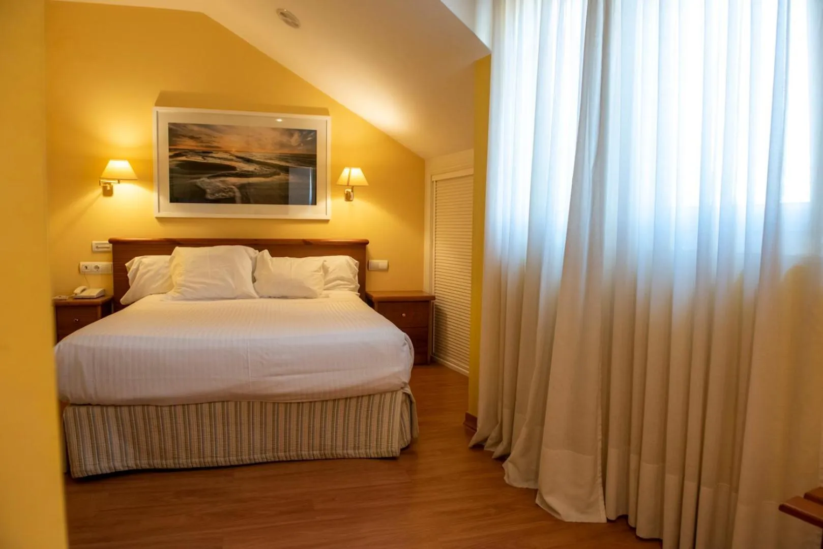 Bed in Hotel Faro de San Vicente