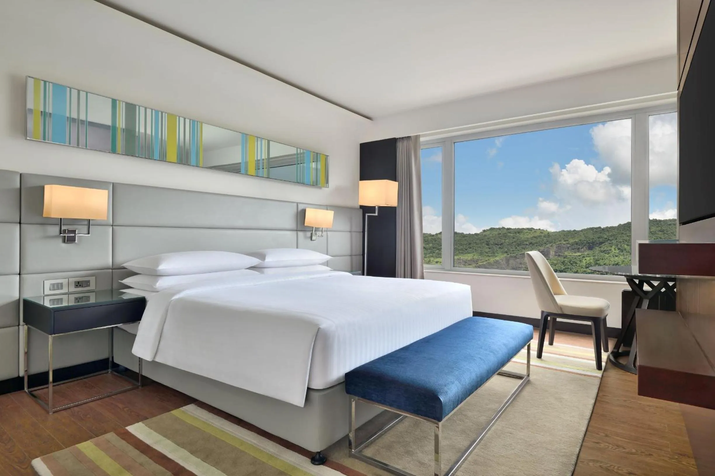 Dining area, Bed in Courtyard by Marriott Navi Mumbai