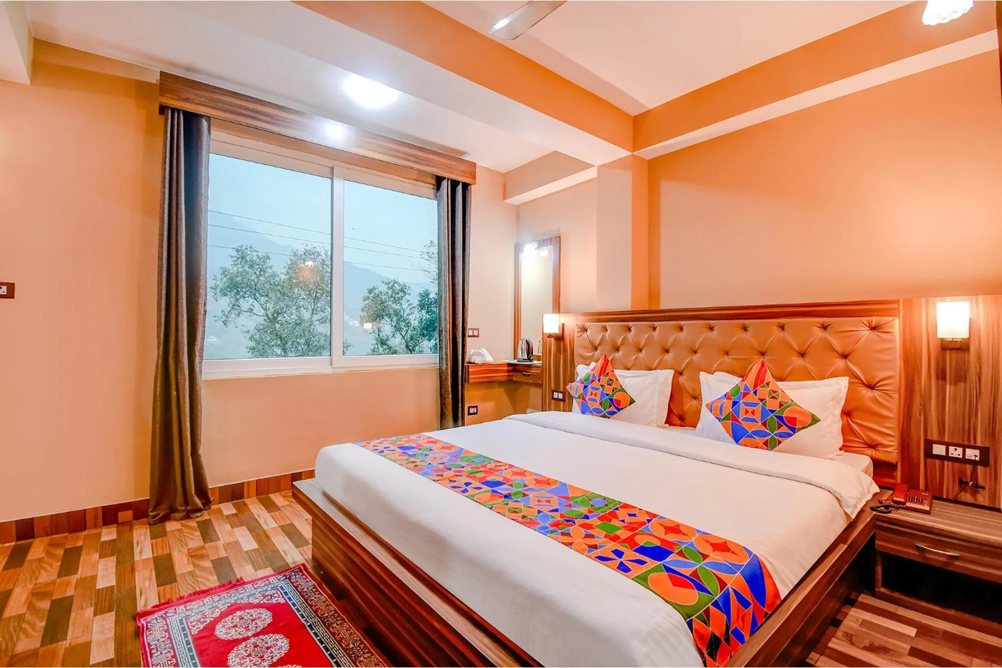 Bed in FabHotel Rikhila's Regency