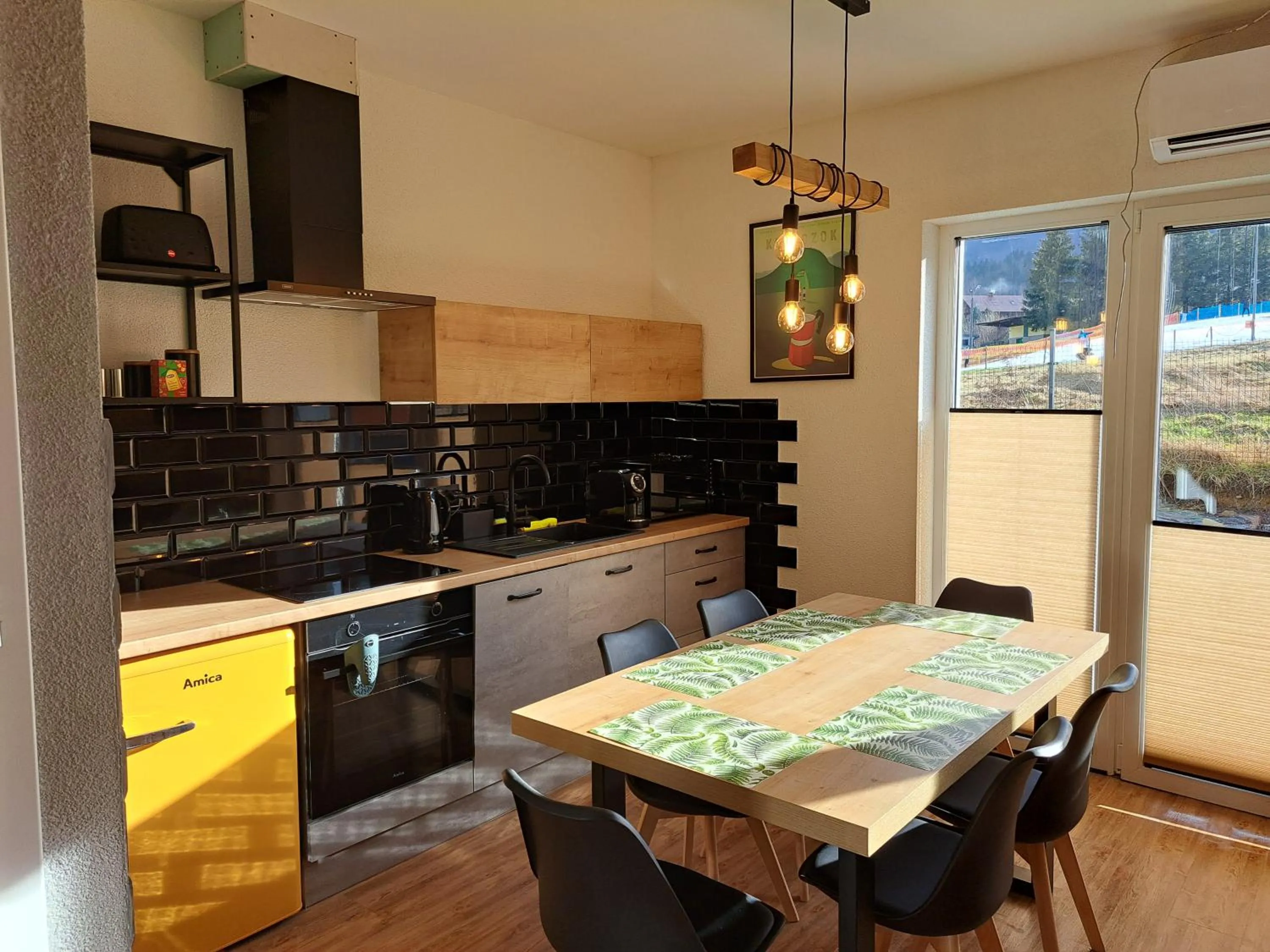 Kitchen or kitchenette in Nad Lipami - apartament z tarasem blisko stoku Sczyrk
