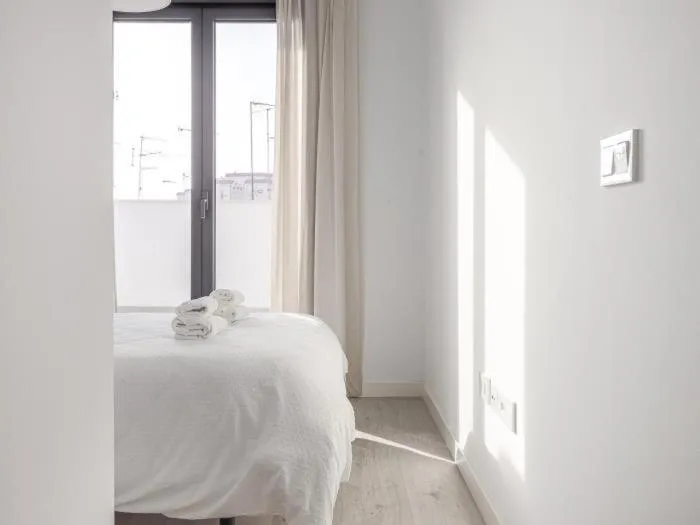 Bed in Uxama Sevilla Luxury Penthouse en Triana - Terraza y parking privados - piscina