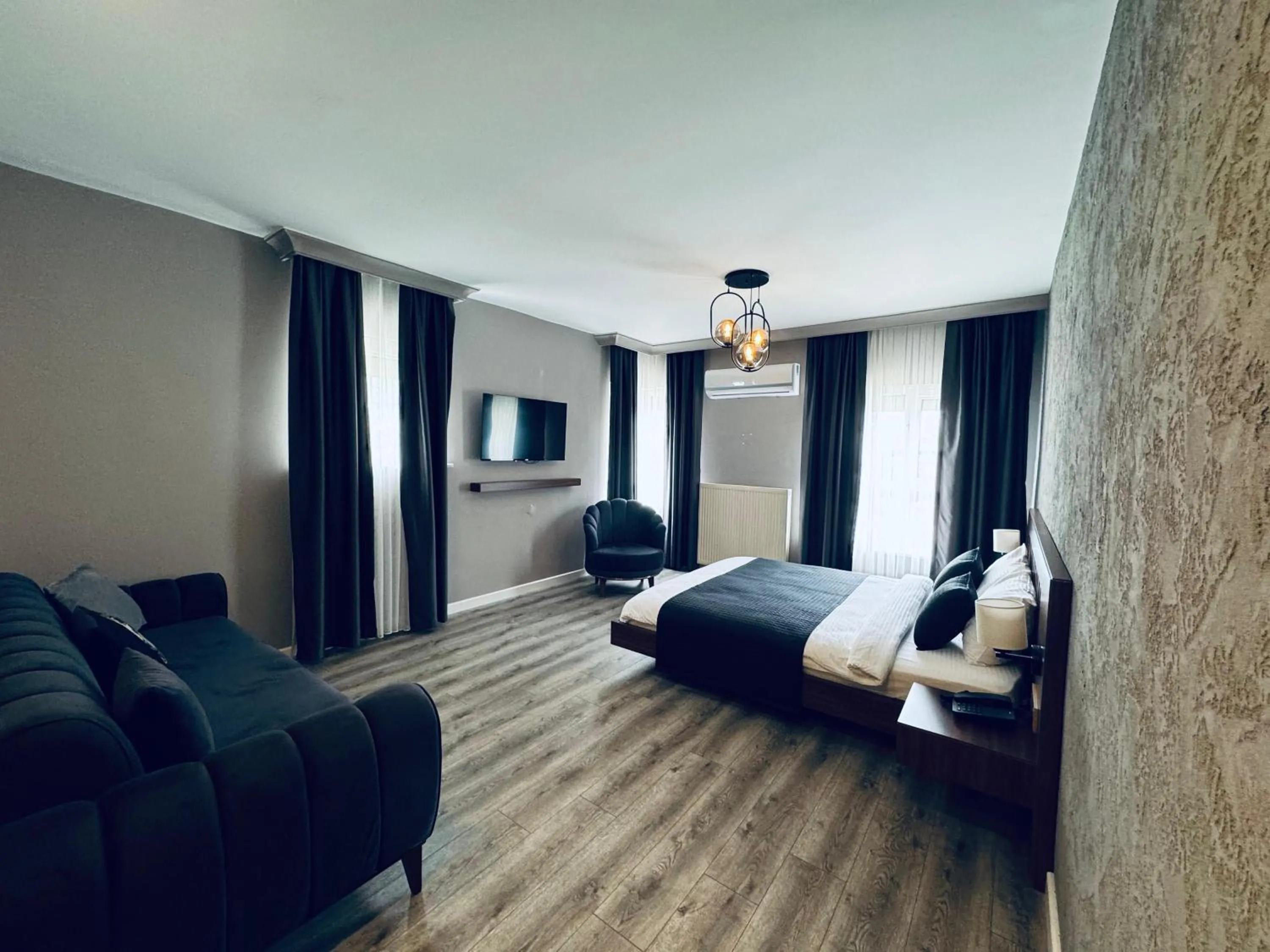 Communal lounge/ TV room, Bed in Istanbul Airport Treekos Suite Hotel