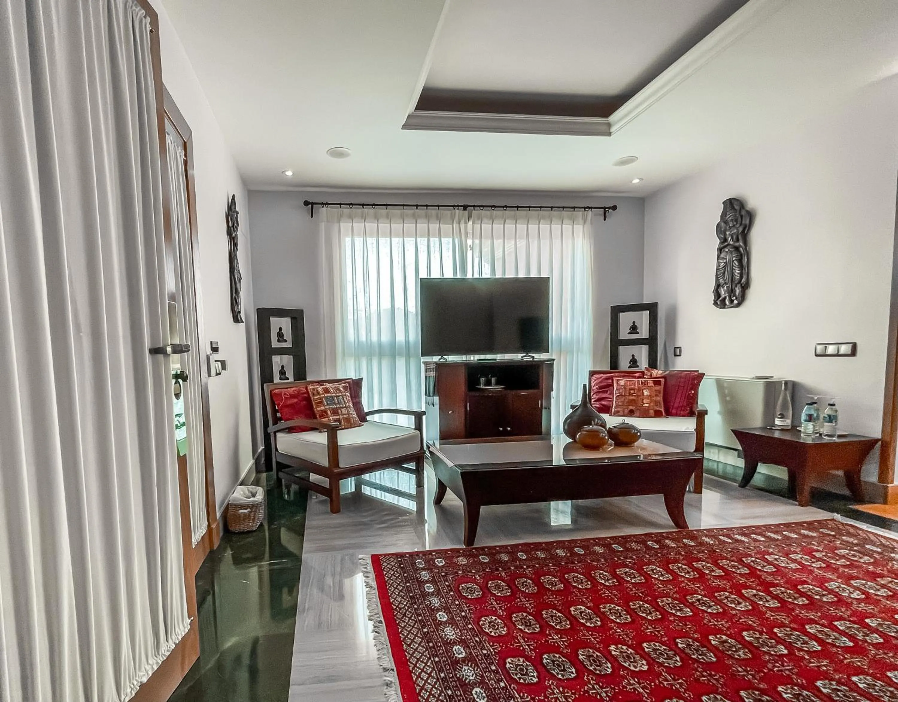 Communal lounge/ TV room in The Marbella Heights Boutique Hotel