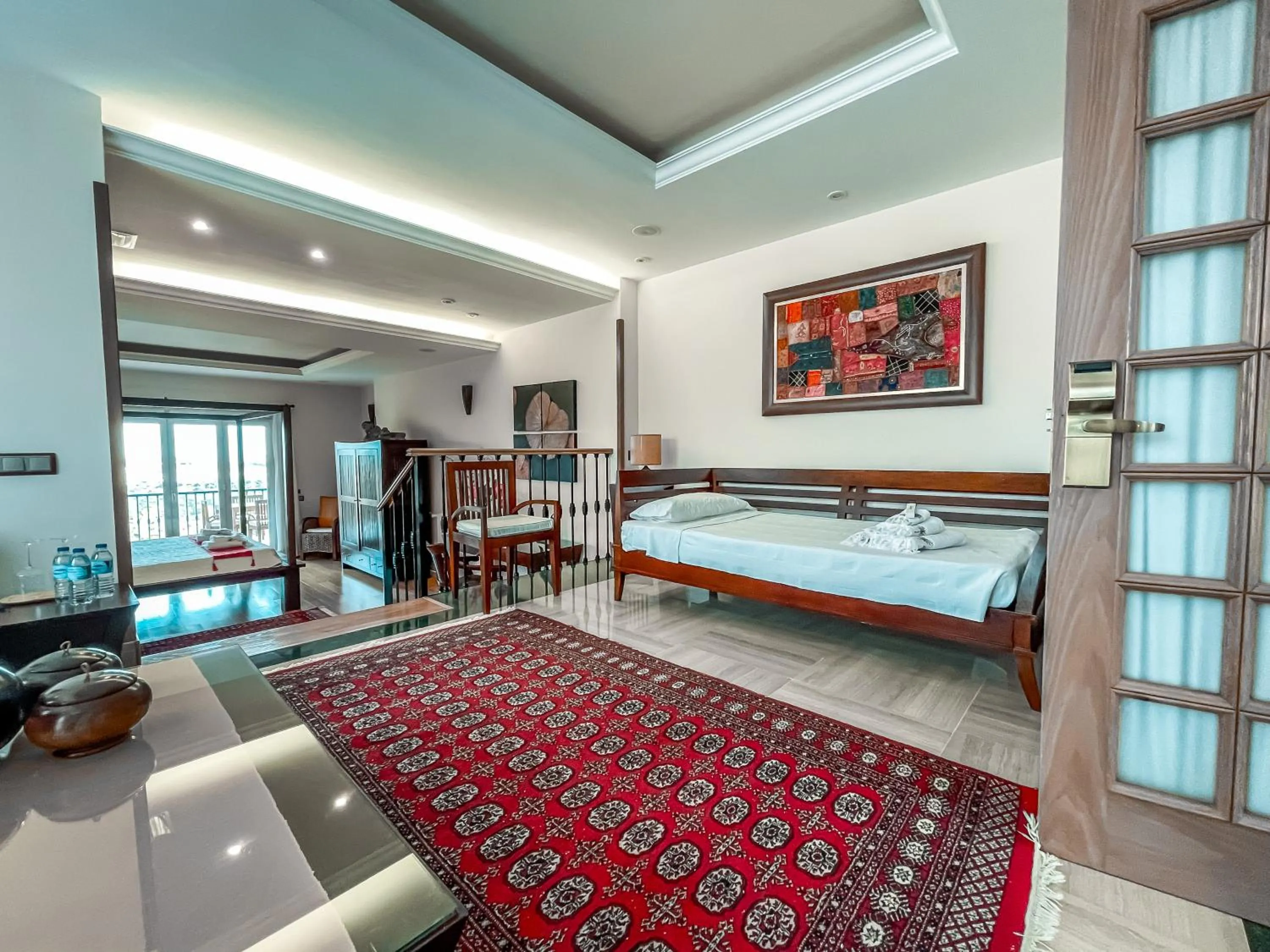 Seating area, Bed in The Marbella Heights Boutique Hotel