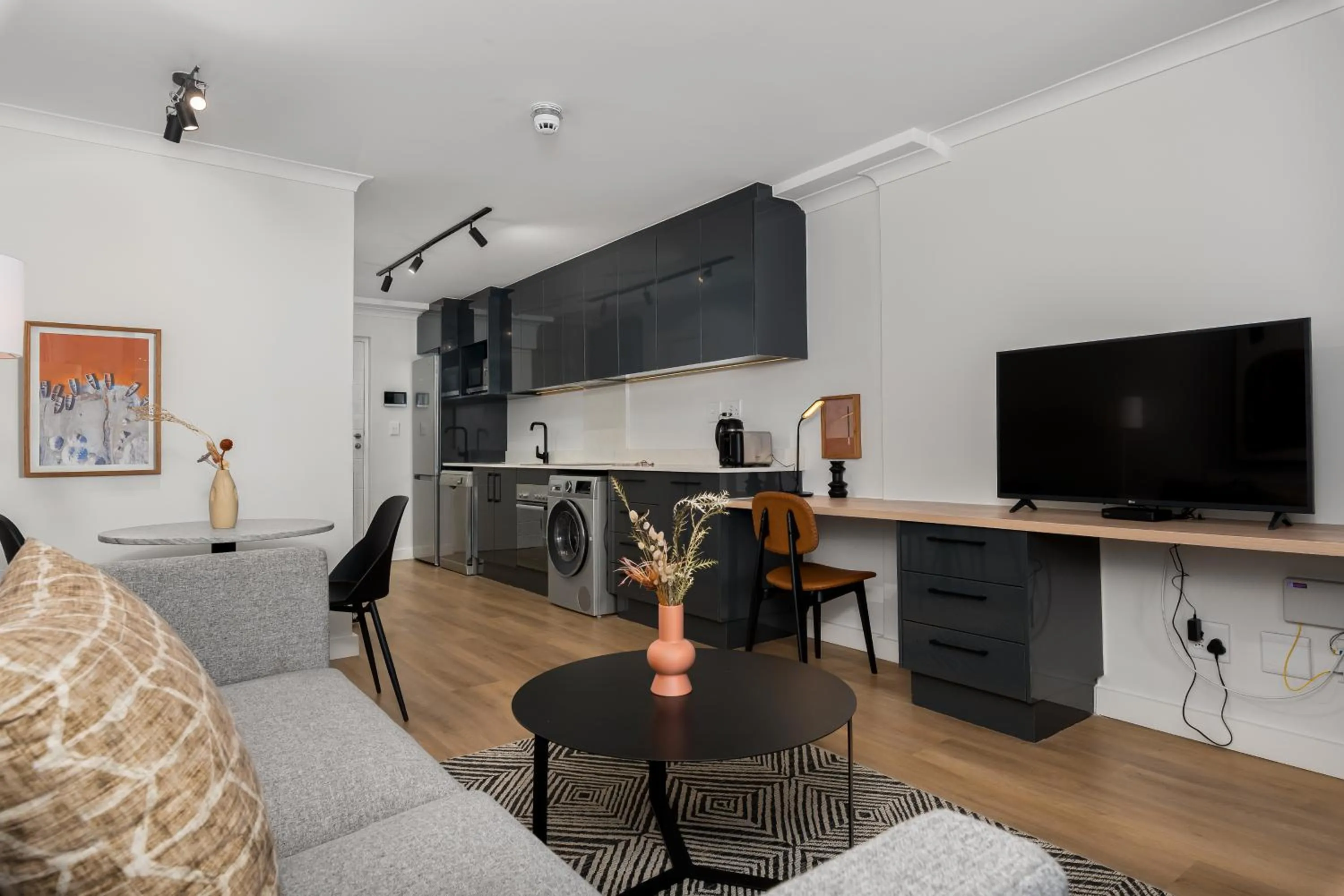 TV and multimedia in Newlands Peak Aparthotel by Totalstay